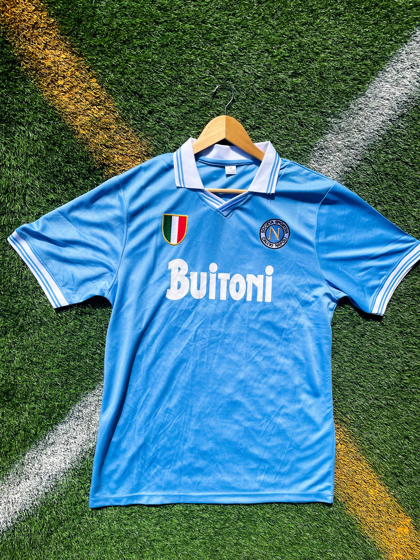 Front view of Napoli 1986 Home Maradona #10 jersey with sky blue and Buitoni sponsor