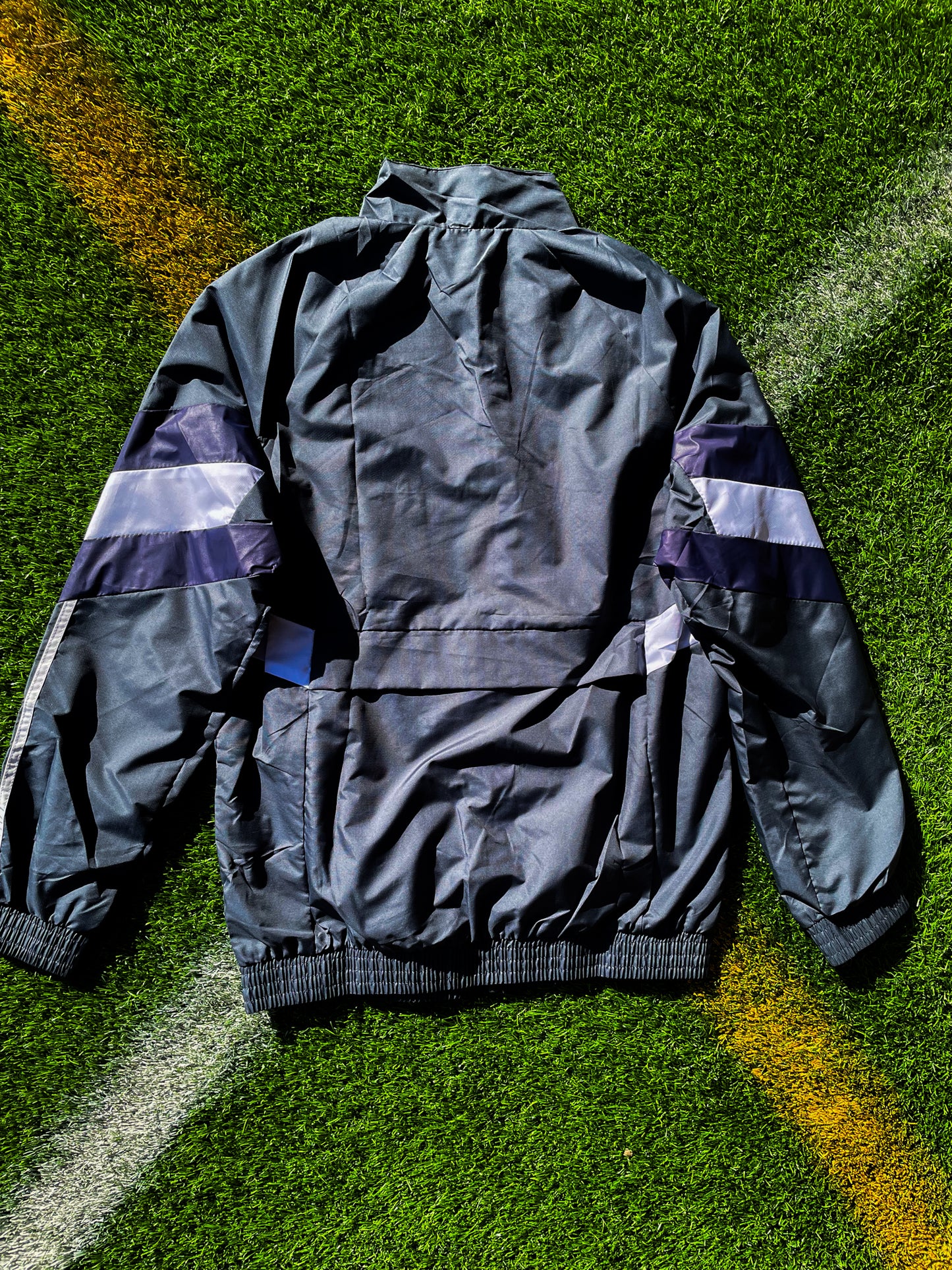 Back of the windbreaker showing clean athletic design