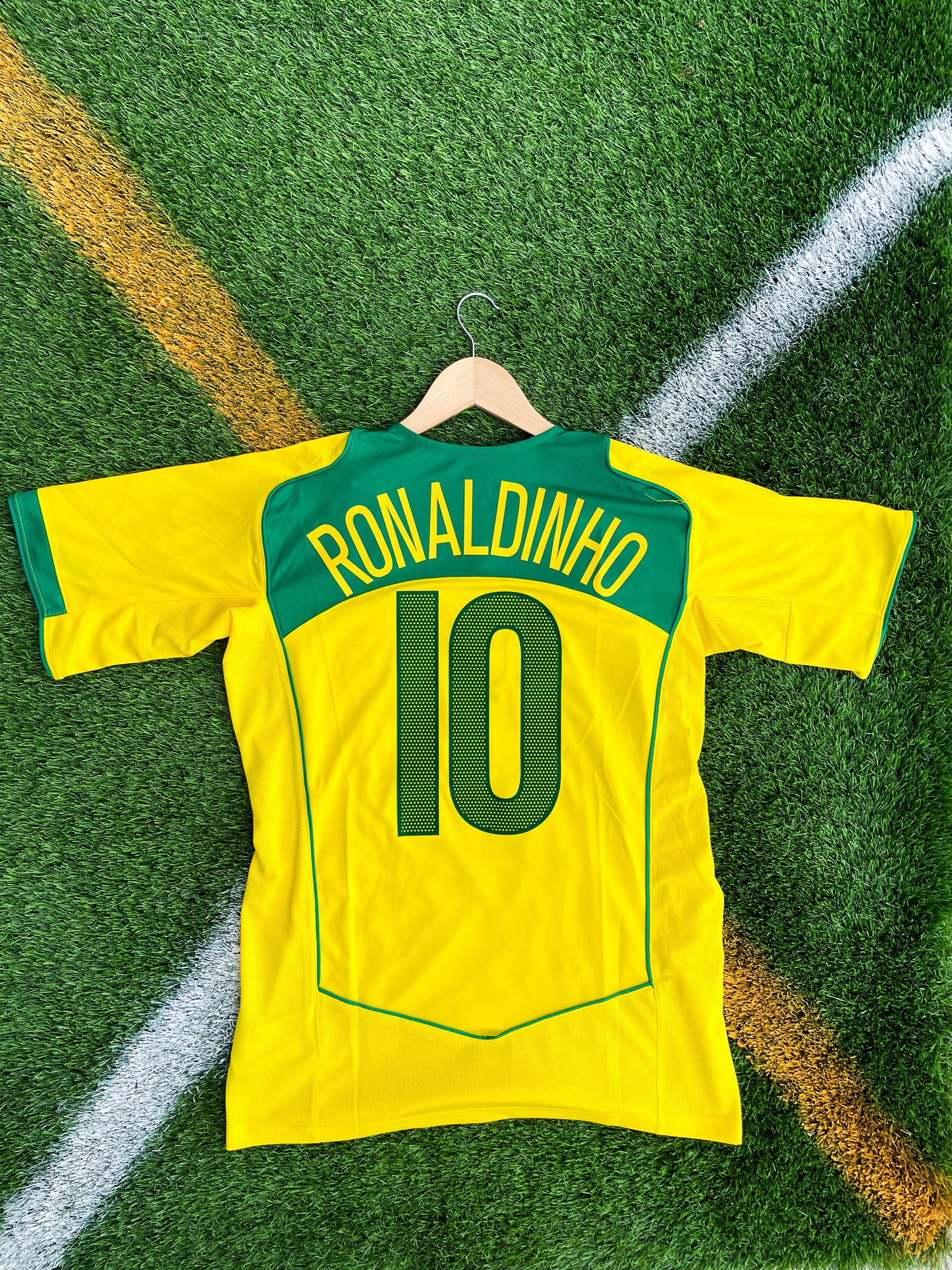 Back view showing Ronaldo #9 and Ronaldinho #10 on the vintage Brazil kit