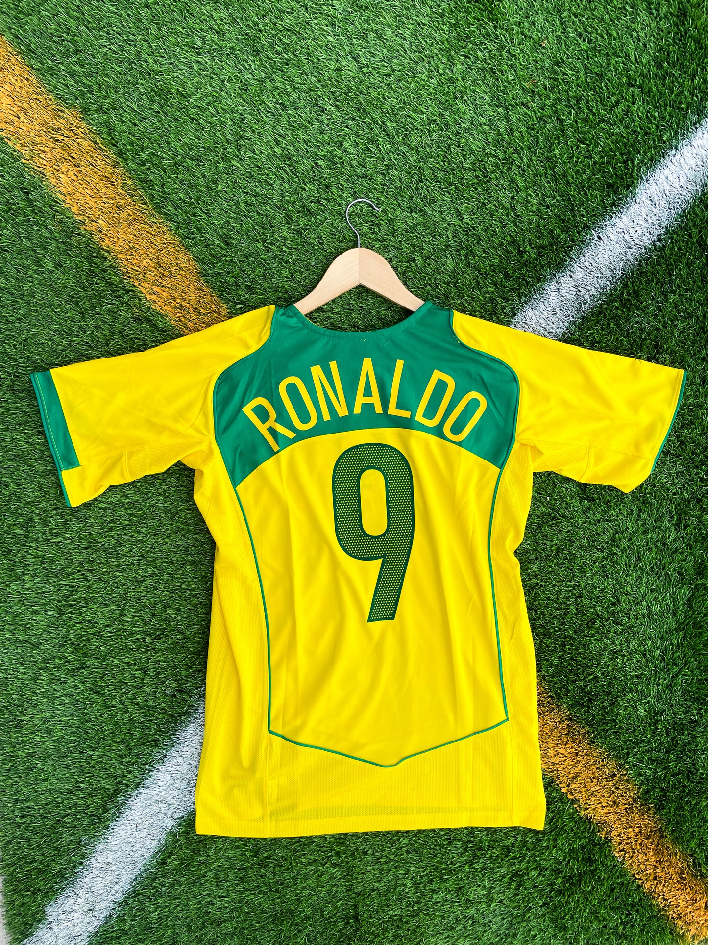 Back view showing Ronaldo #9 and Ronaldinho #10 on the vintage Brazil kit