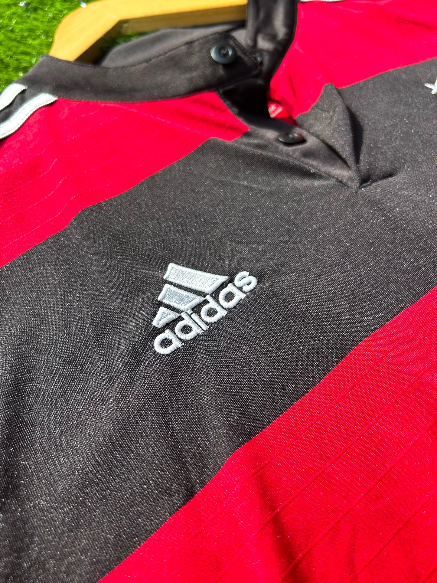 Close-up of DFB crest and Adidas logo on chest