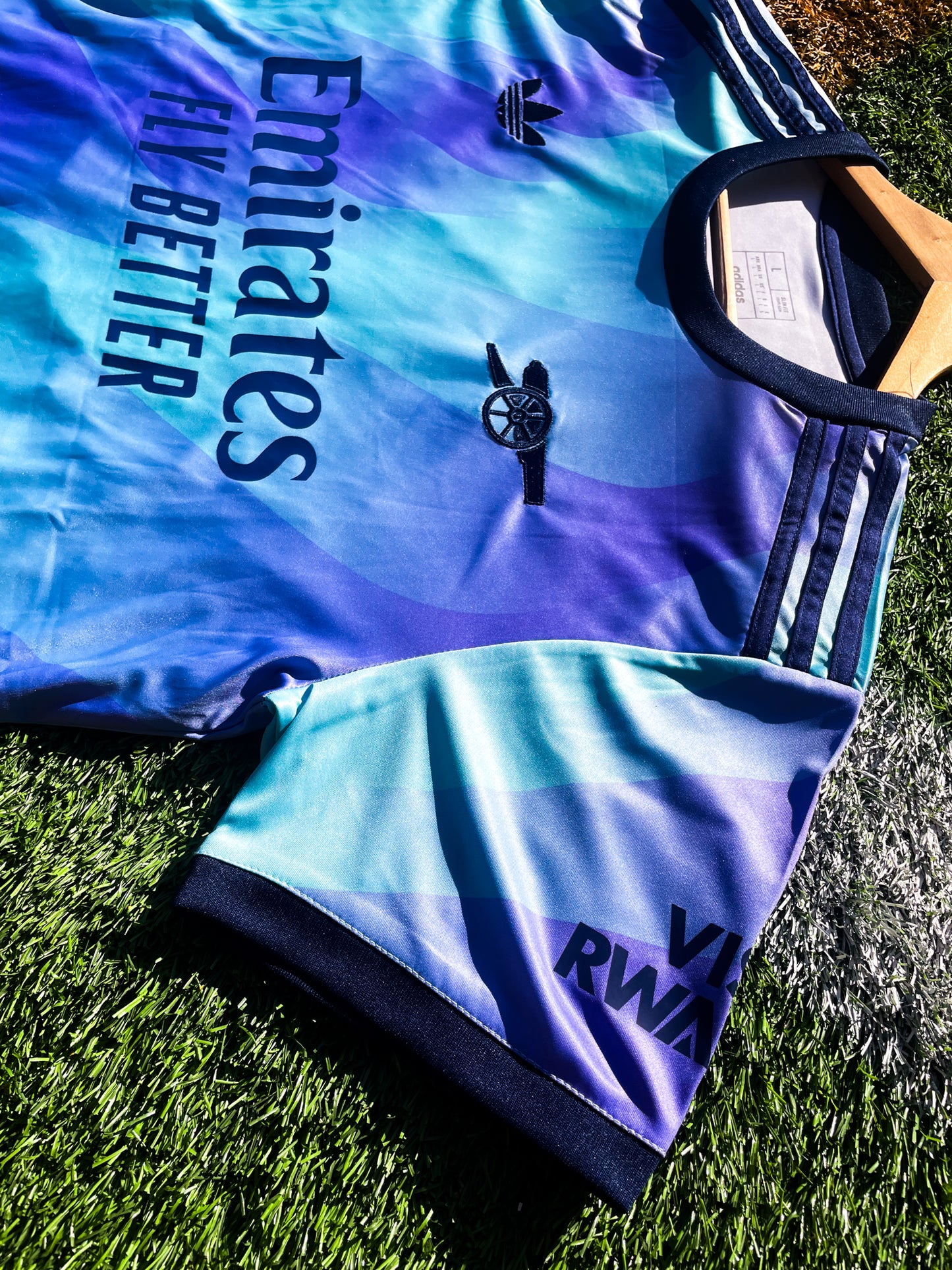 Close-up of Arsenal crest on the bold third kit design