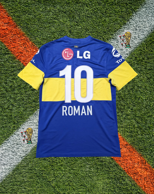 Boca Juniors 2011–2012 Home Jersey – ROMÁN #10 – La Bombonera Legend