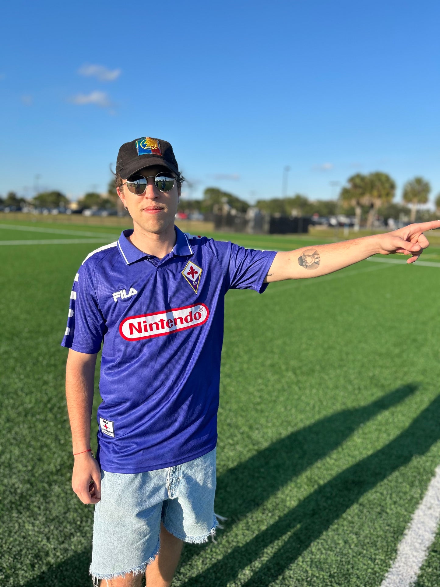 Styled streetwear look featuring the vintage 1998-99 Fiorentina jersey