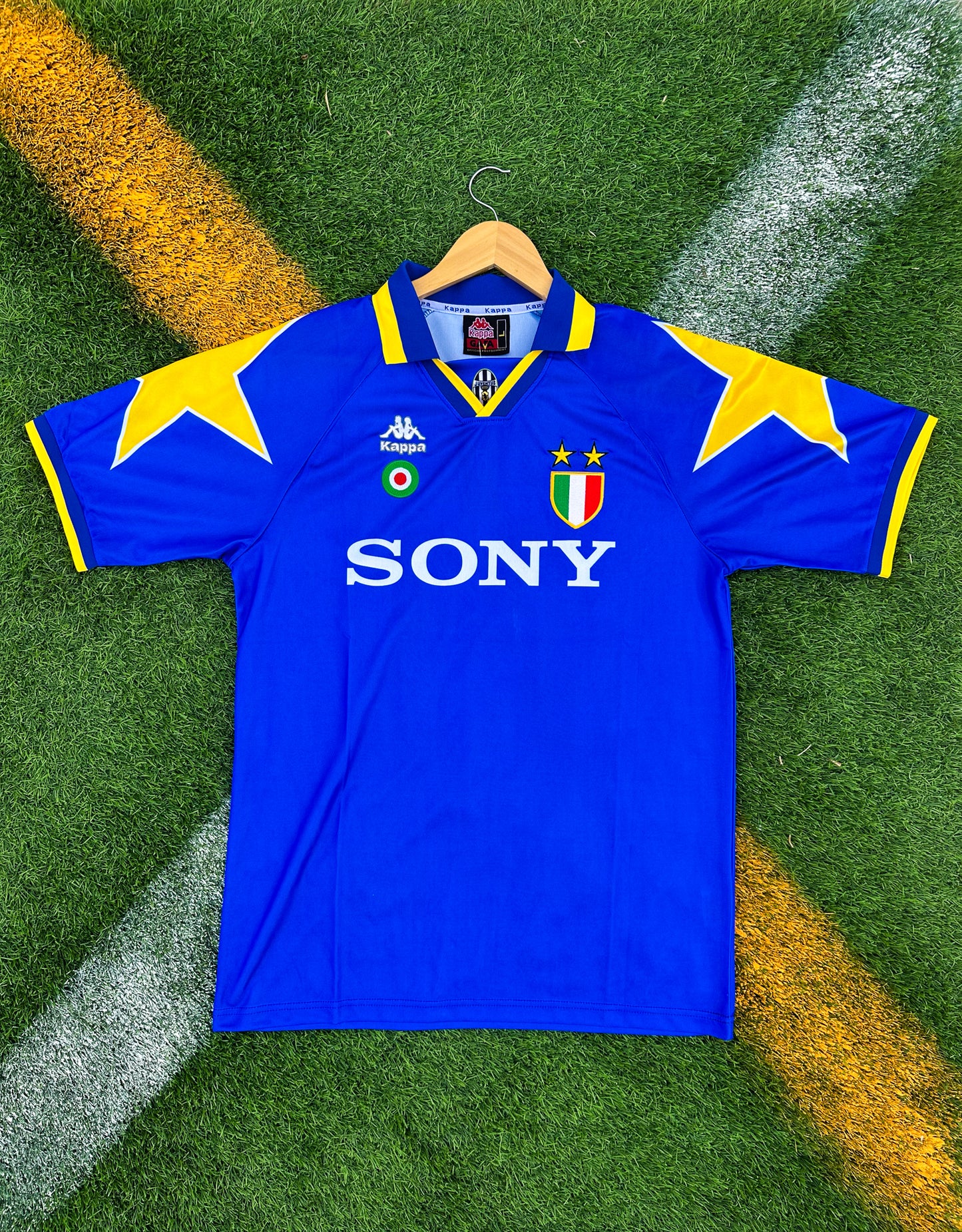 Front view of Juventus 1997/1998 third jersey in blue and yellow featuring Zidane #21