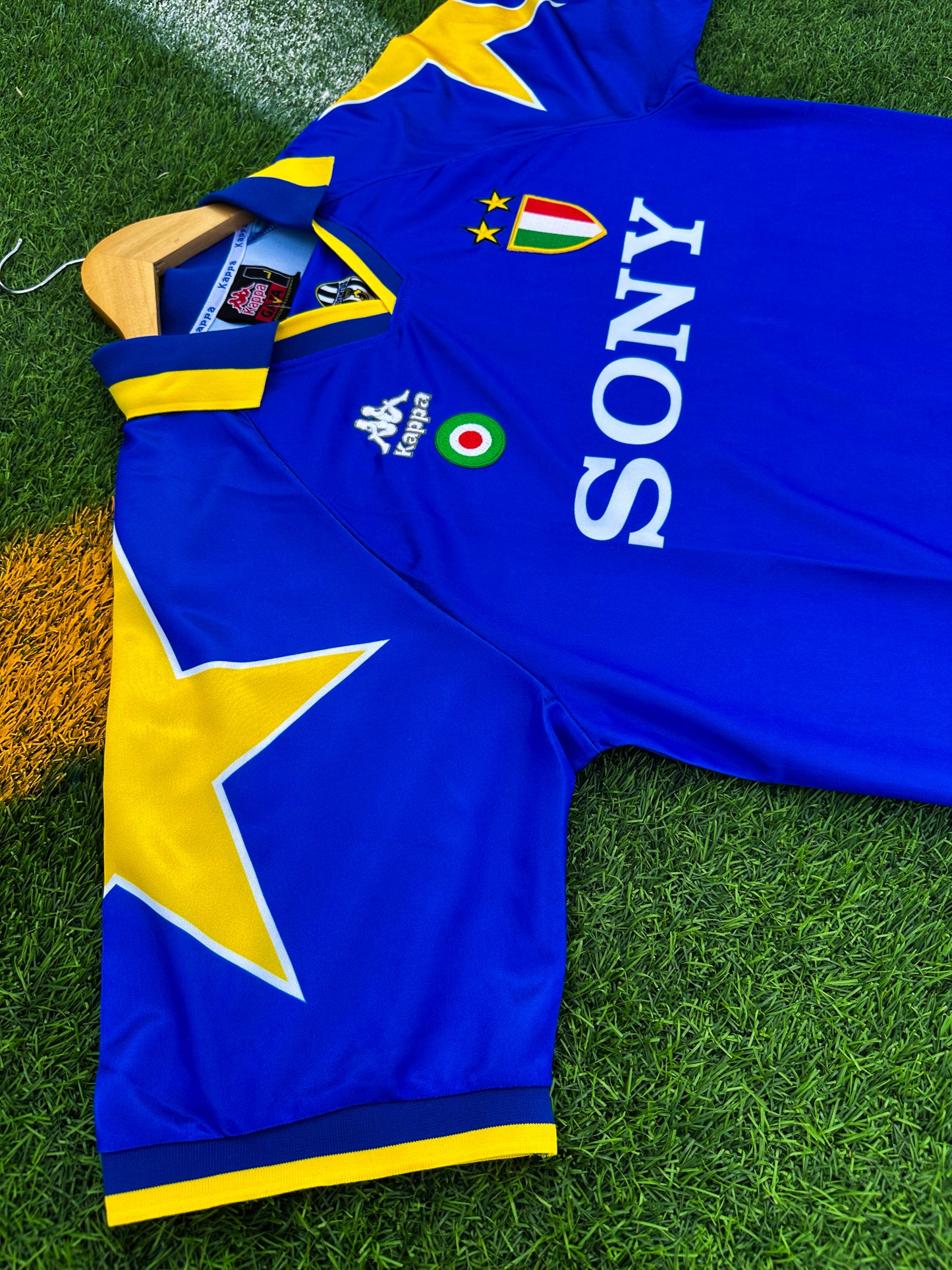 Close-up of Kappa logo and Sony sponsor on vintage Juventus jersey