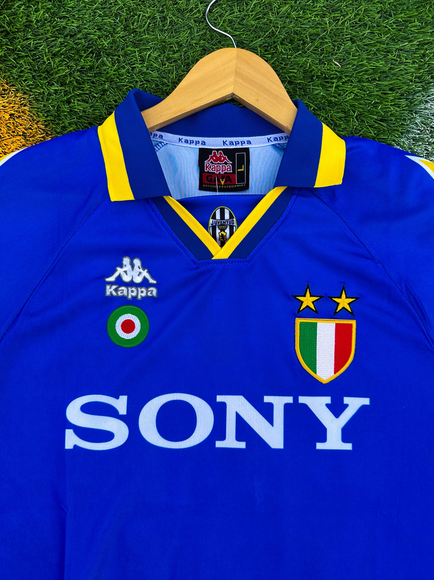 Close-up of Kappa logo and Sony sponsor on vintage Juventus jersey