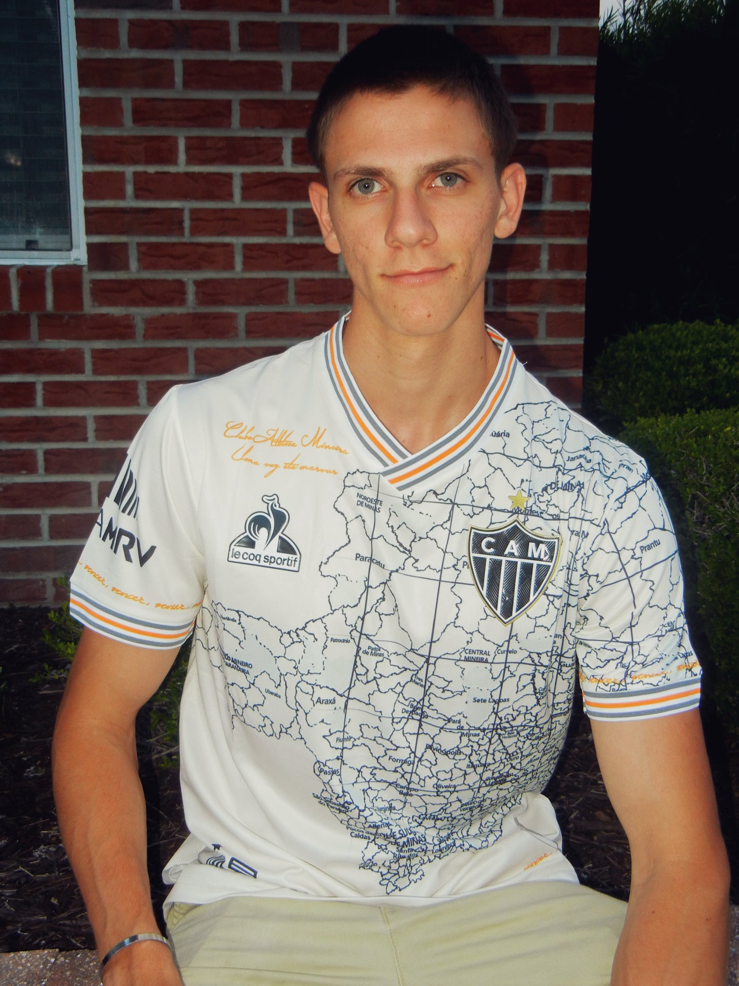 Styled model wearing the Atlético Mineiro anniversary jersey in a city setting
