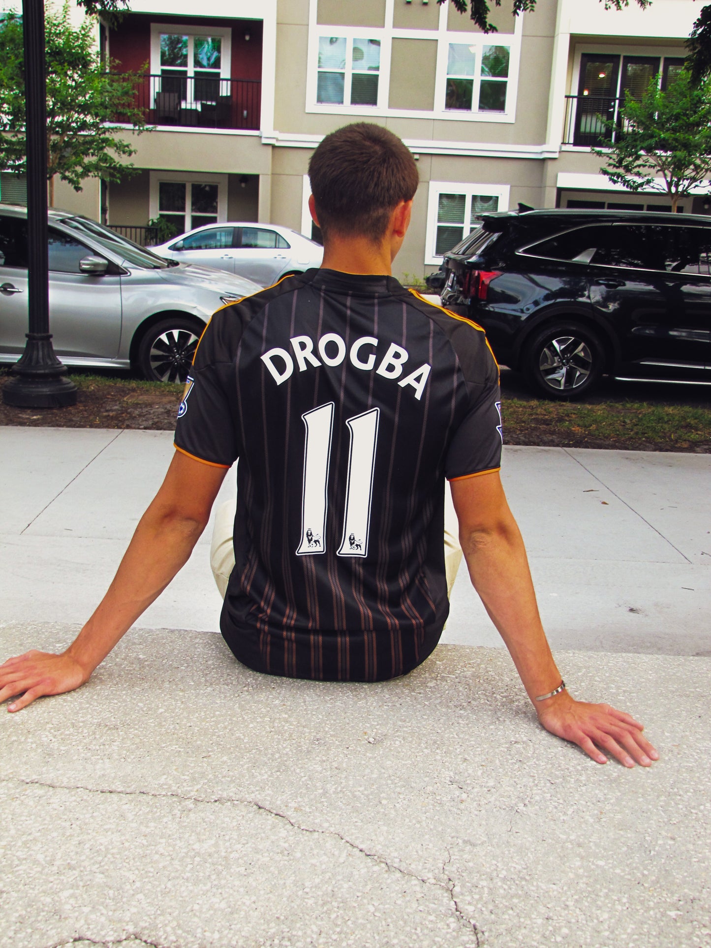 Styled look with Chelsea 2010–2011 black and orange away jersey featuring Drogba
