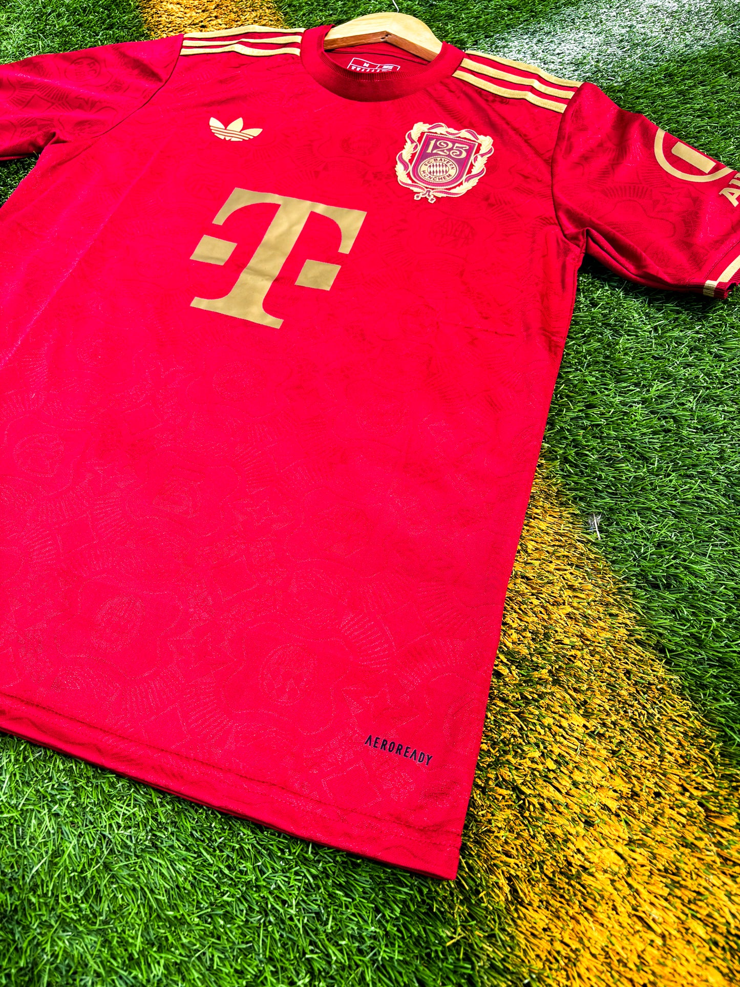 Close-up of Bayern Munich club crest and anniversary badge