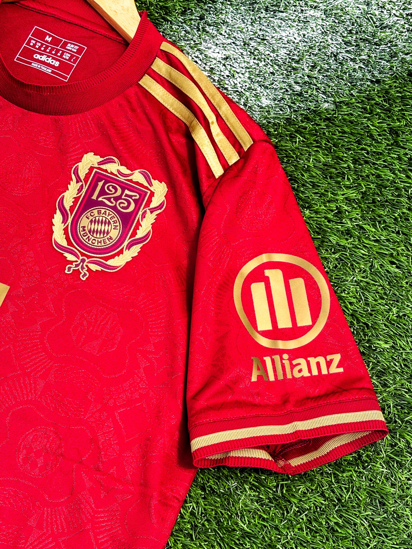 Close-up of Bayern Munich club crest and anniversary badge