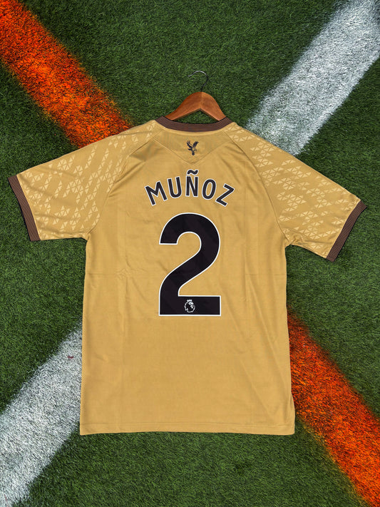 Crystal Palace 2025‑26 Away Jersey – Gold & Black – Muñoz #2