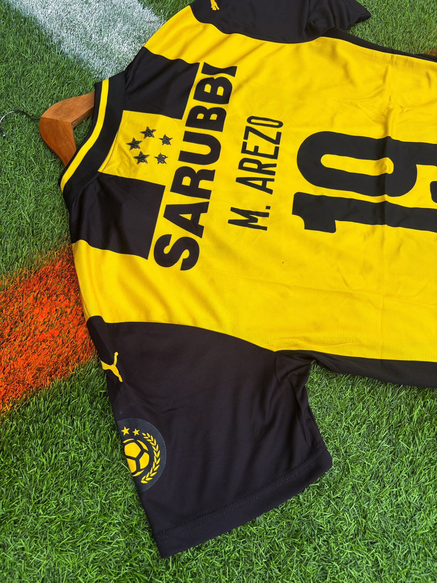 Peñarol 2025 Home Jersey – Arezo #19 – Classic Stripes by Puma