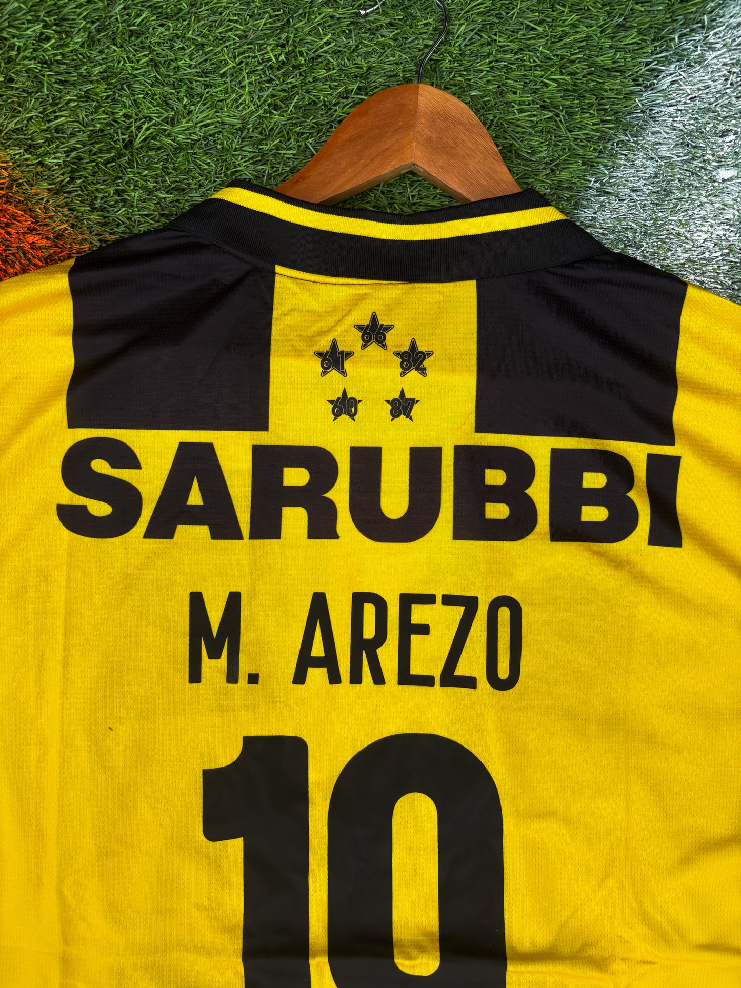 Peñarol 2025 Home Jersey – Arezo #19 – Classic Stripes by Puma