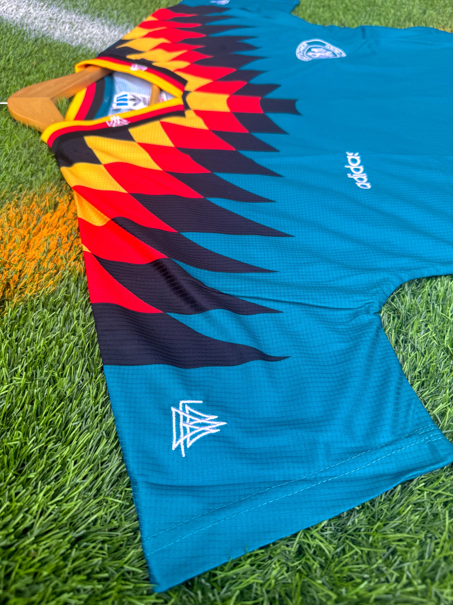 Detail of geometric sleeve design and fabric texture