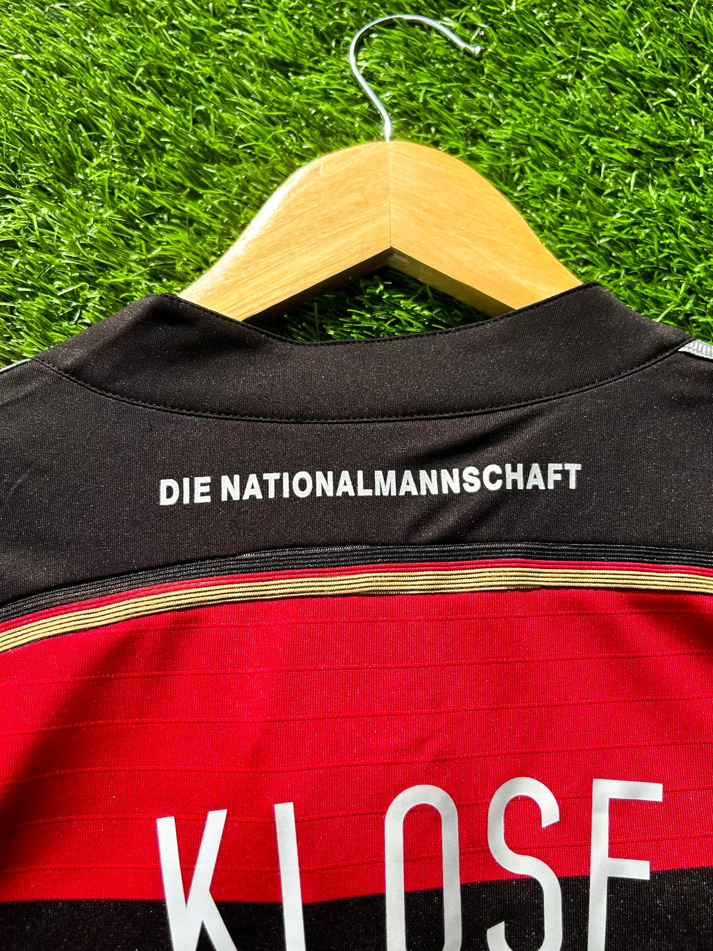 Close-up of DFB crest and Adidas logo on chest