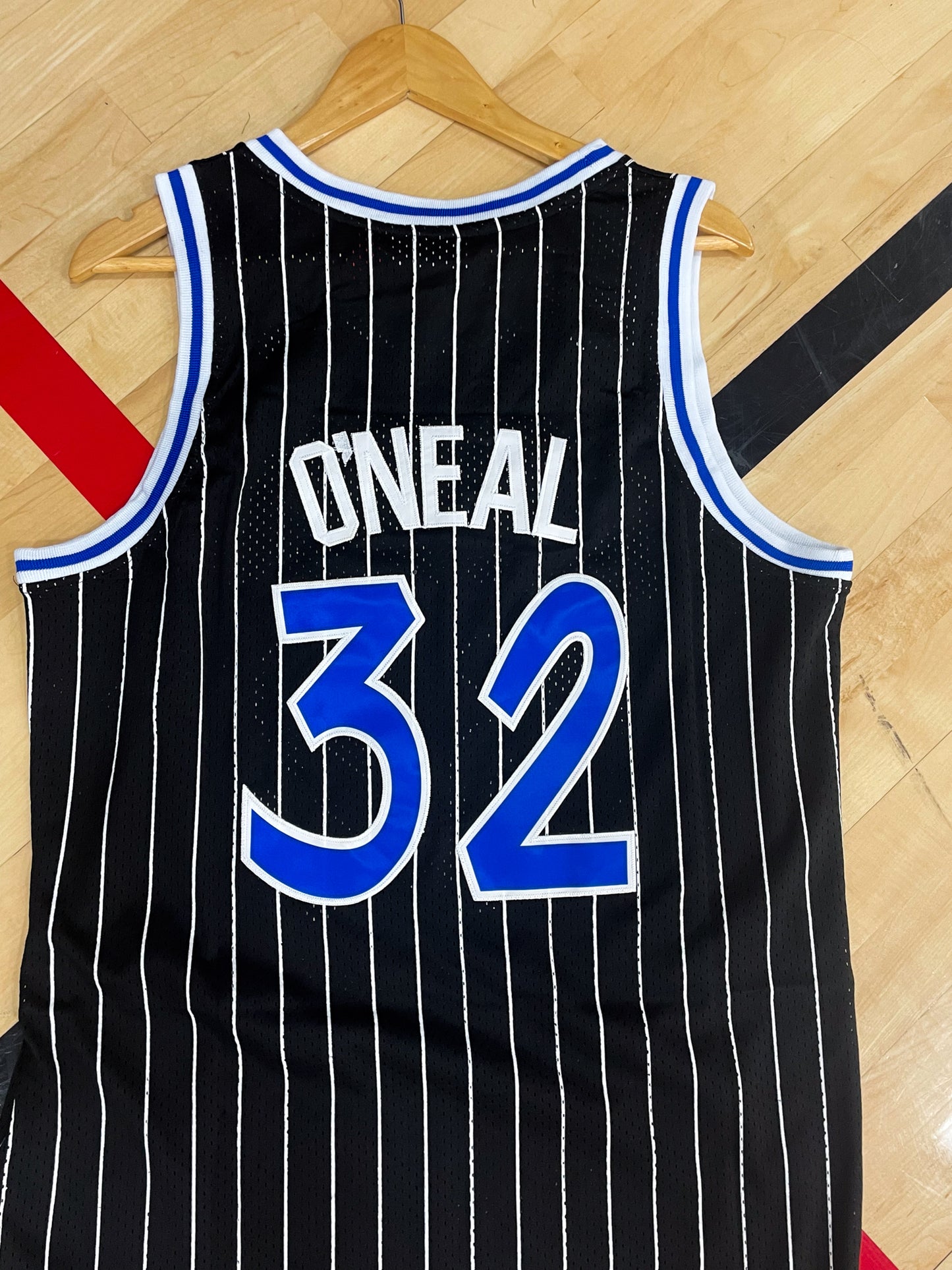 back view of the 1994/1995 Orlando Magic black jersey with Shaquille O’Neal detailing