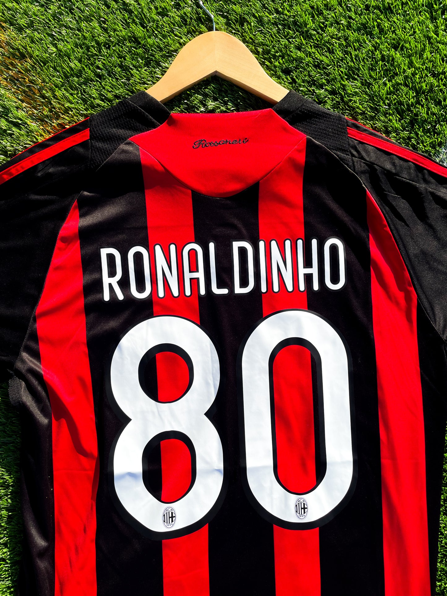 Close-up of Adidas stripes and Bwin sponsor logo