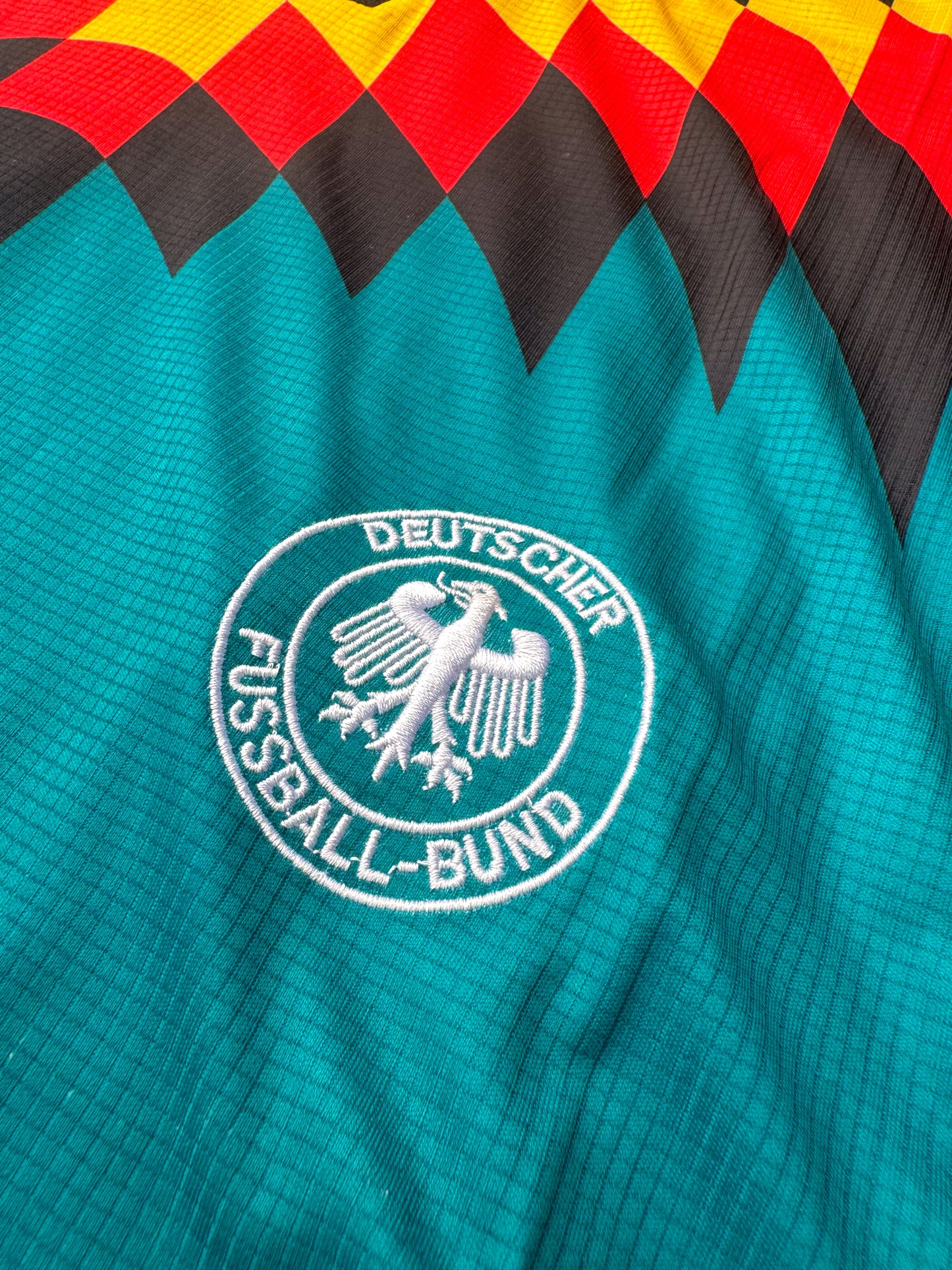 Close-up of DFB crest and Adidas embroidery
