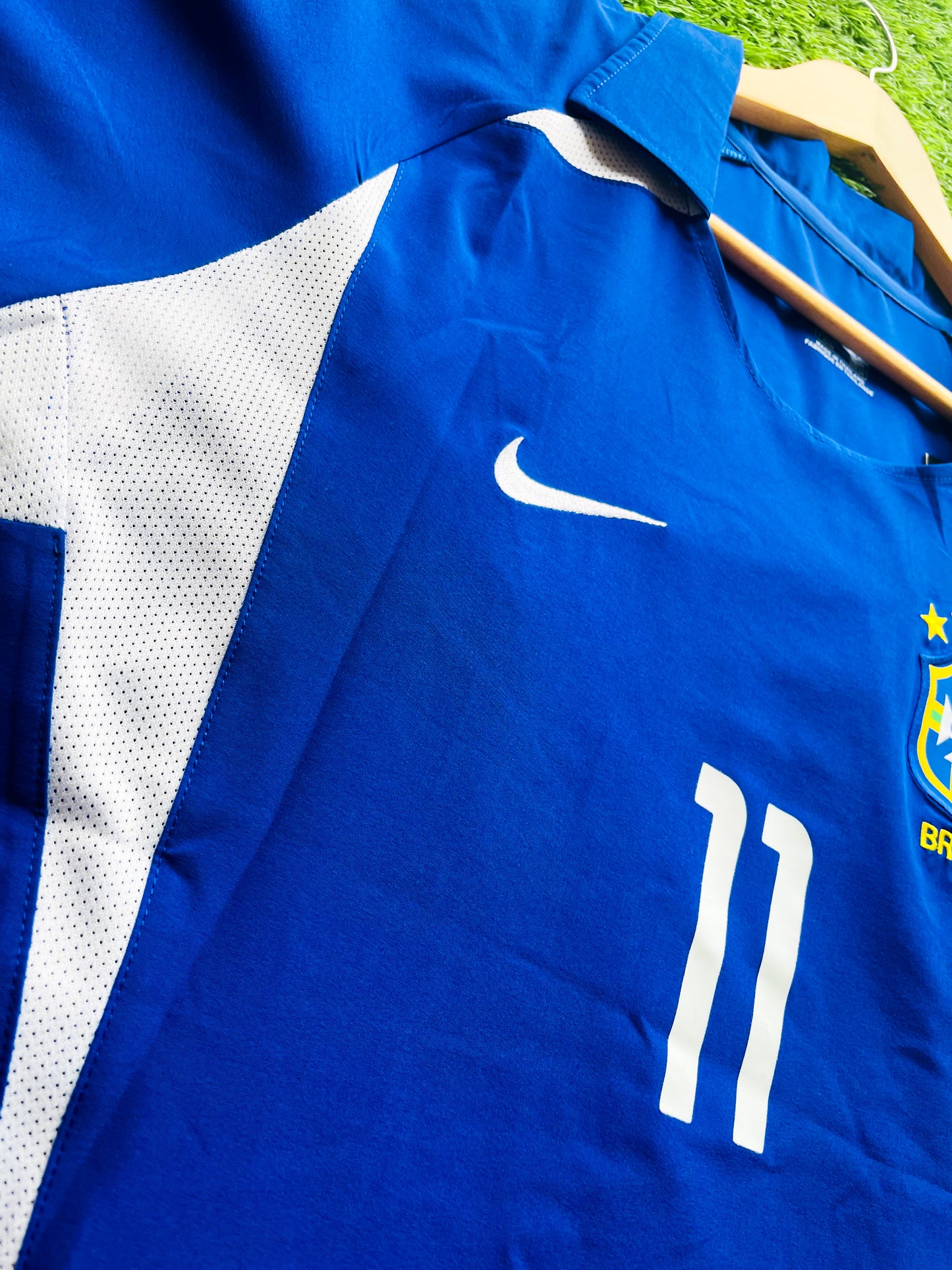 Close-up of Brazil national team crest on 2002 blue and white away jersey
