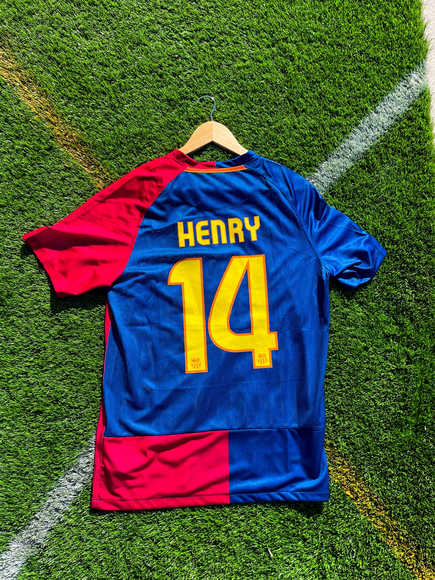 Back of jersey with Henry #14 and yellow font

