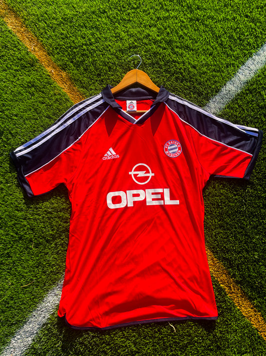 Front view of Bayern Munich 1999-2000 Home Opel jersey in red and navy

