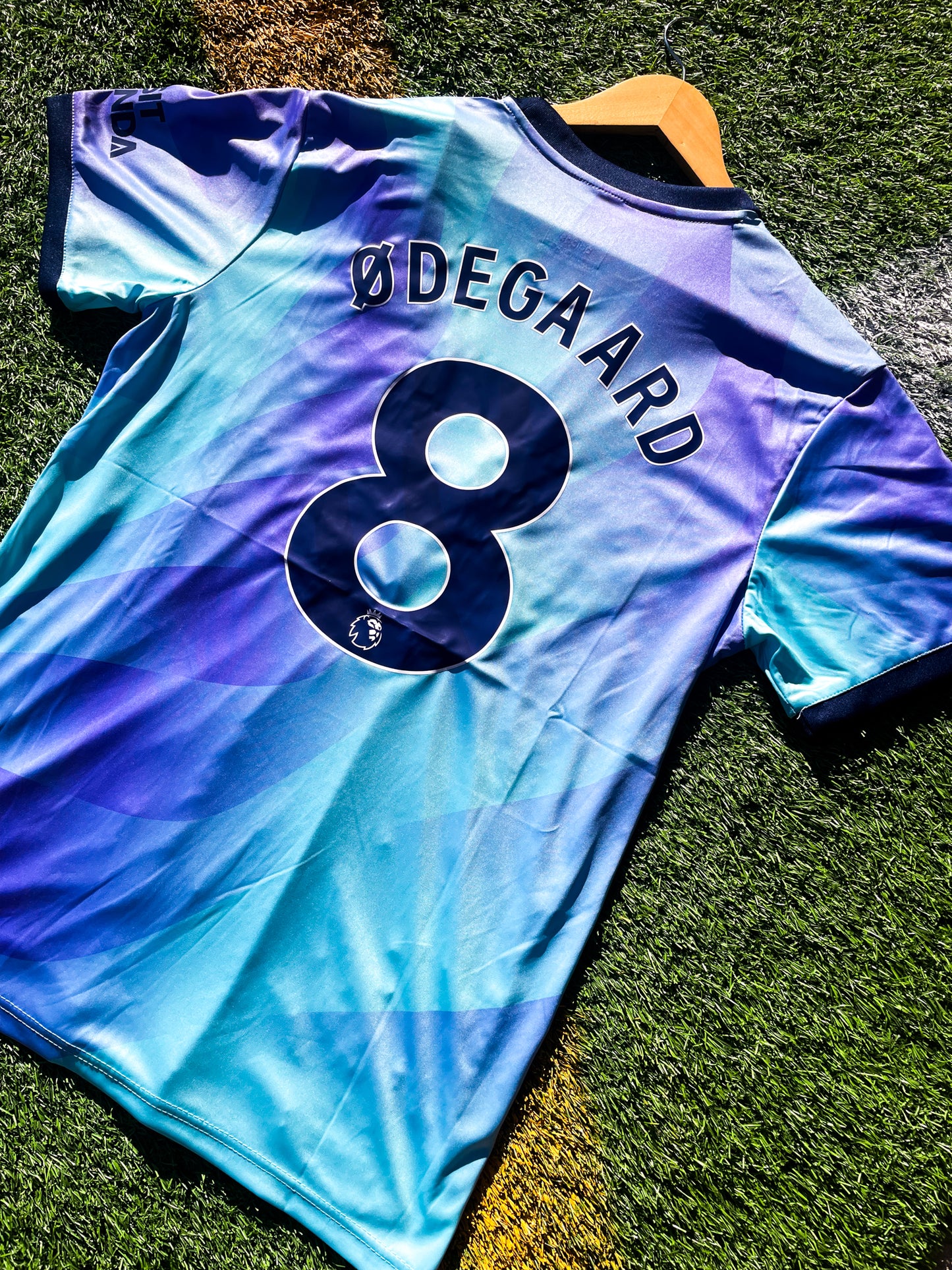 Back view featuring Ødegaard #8 on the Arsenal 2024–2025 third shirt

