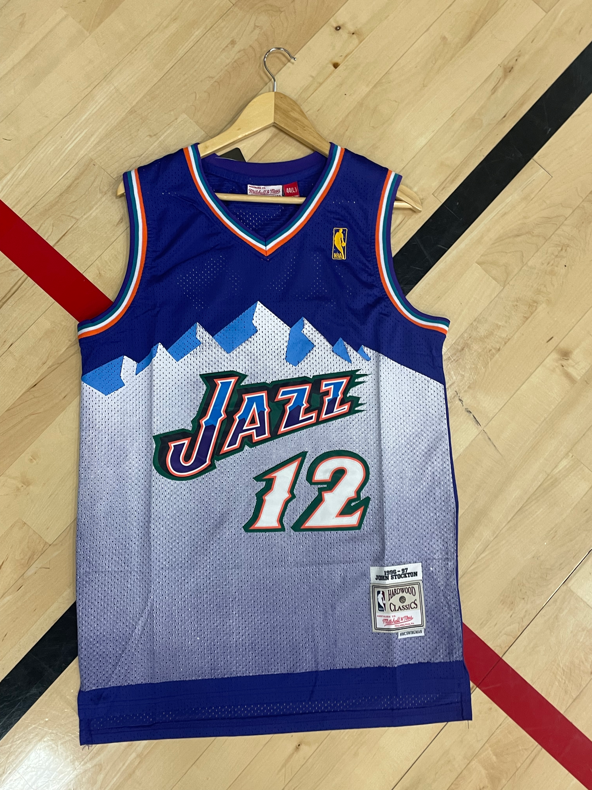 Front view of Utah Jazz 1996–1997 John Stockton #12 purple and green jersey

