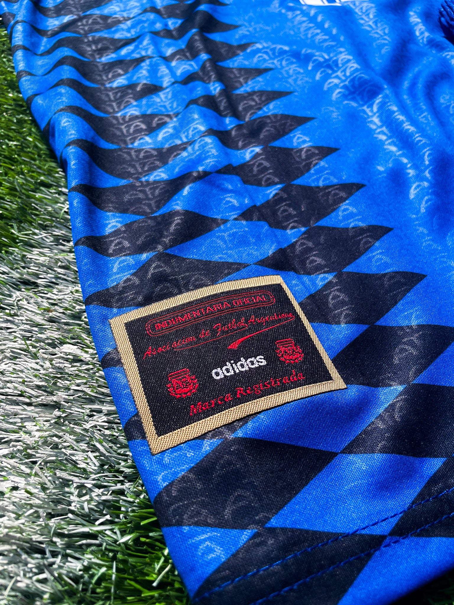 Detail shot of fabric pattern and stitching on the Argentina 1994 youth kit.
