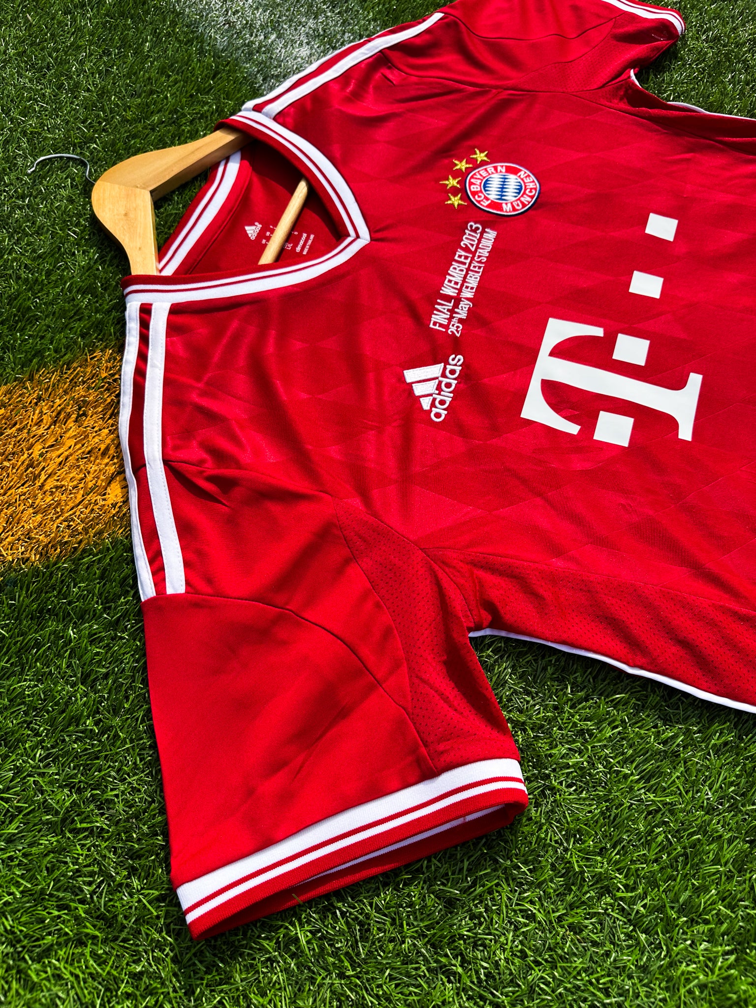 Close-up of Bayern crest and Champions League final detail

