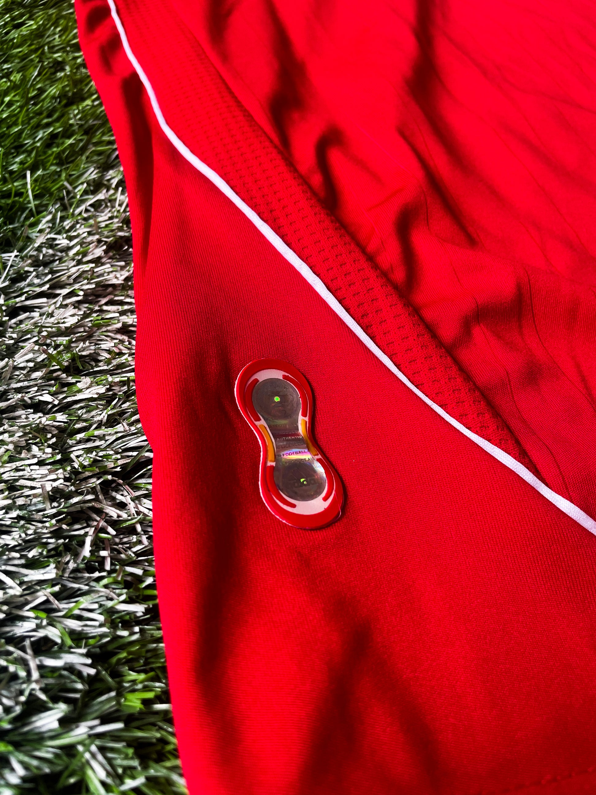 Close-up of club crest and Adidas detailing from 2006

