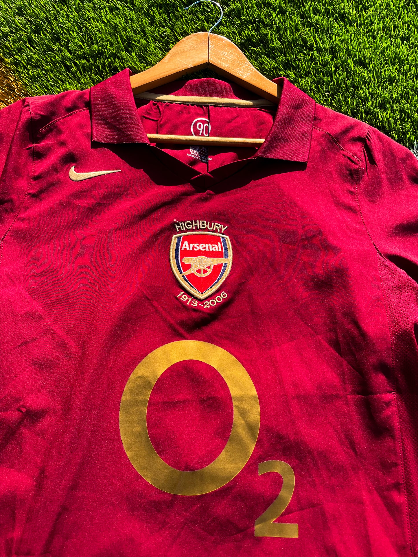 Close-up of embroidered Arsenal crest and Nike logo


