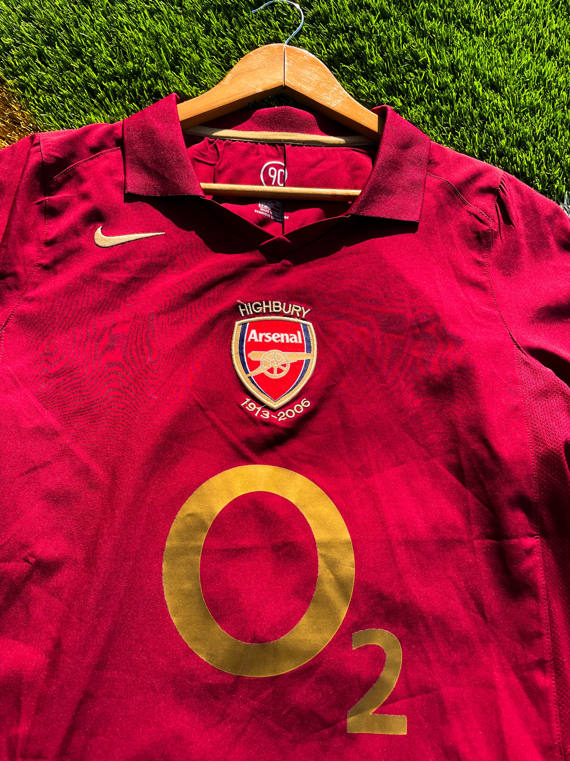 Close-up of embroidered Arsenal crest and Nike logo

