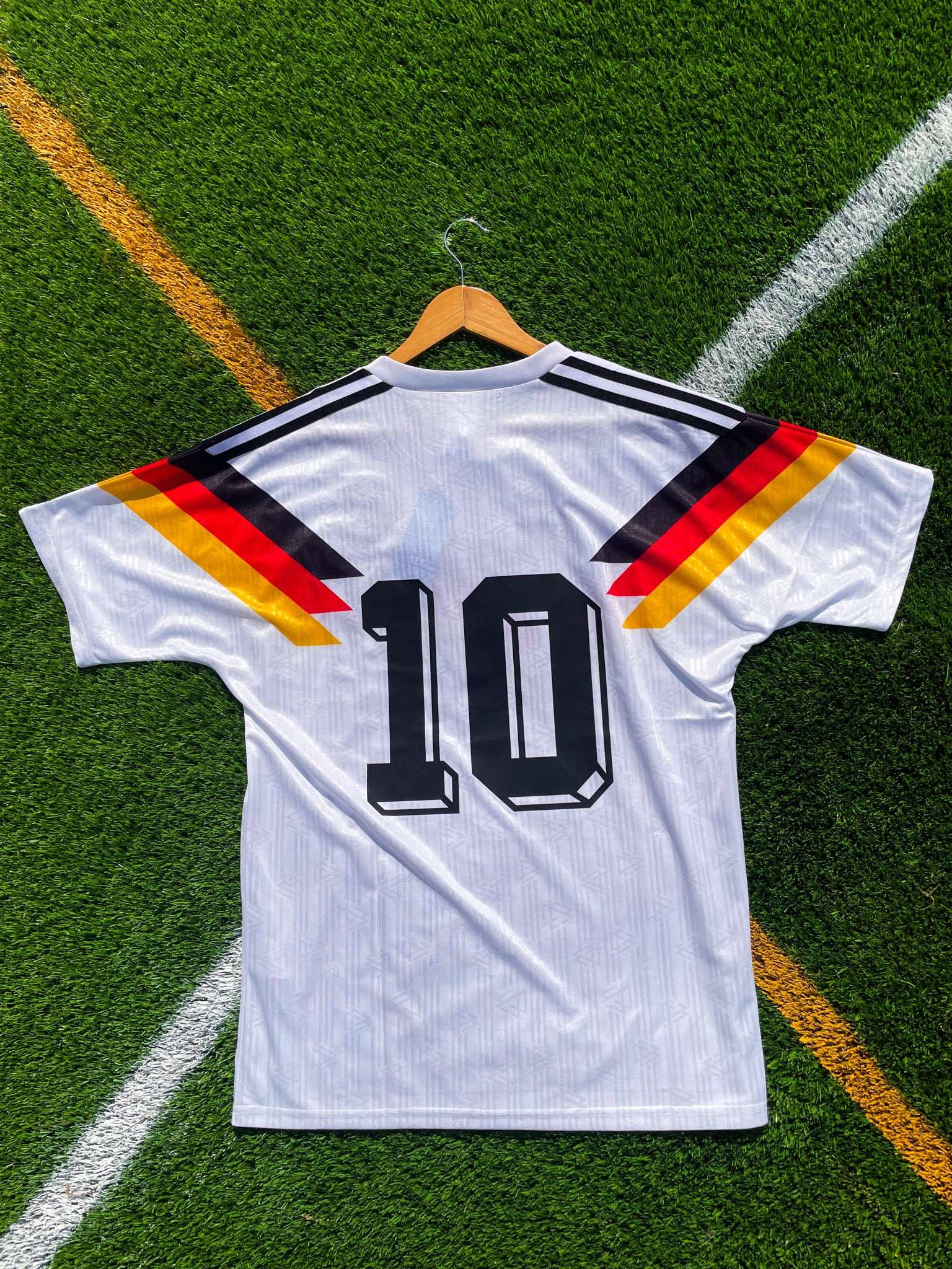 Back of the jersey featuring #10 in bold black font

