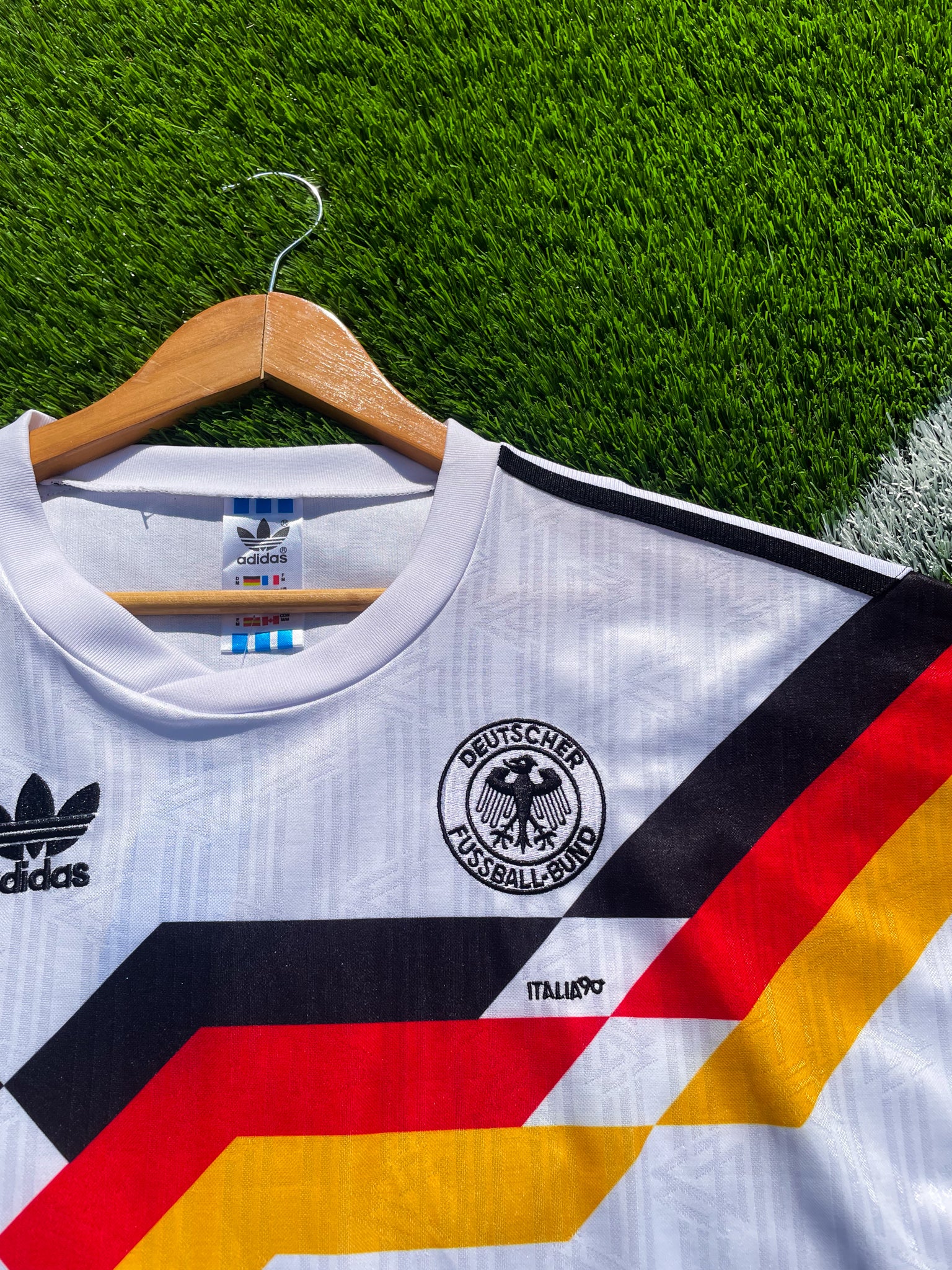 Close-up of DFB crest and Adidas shoulder logo

