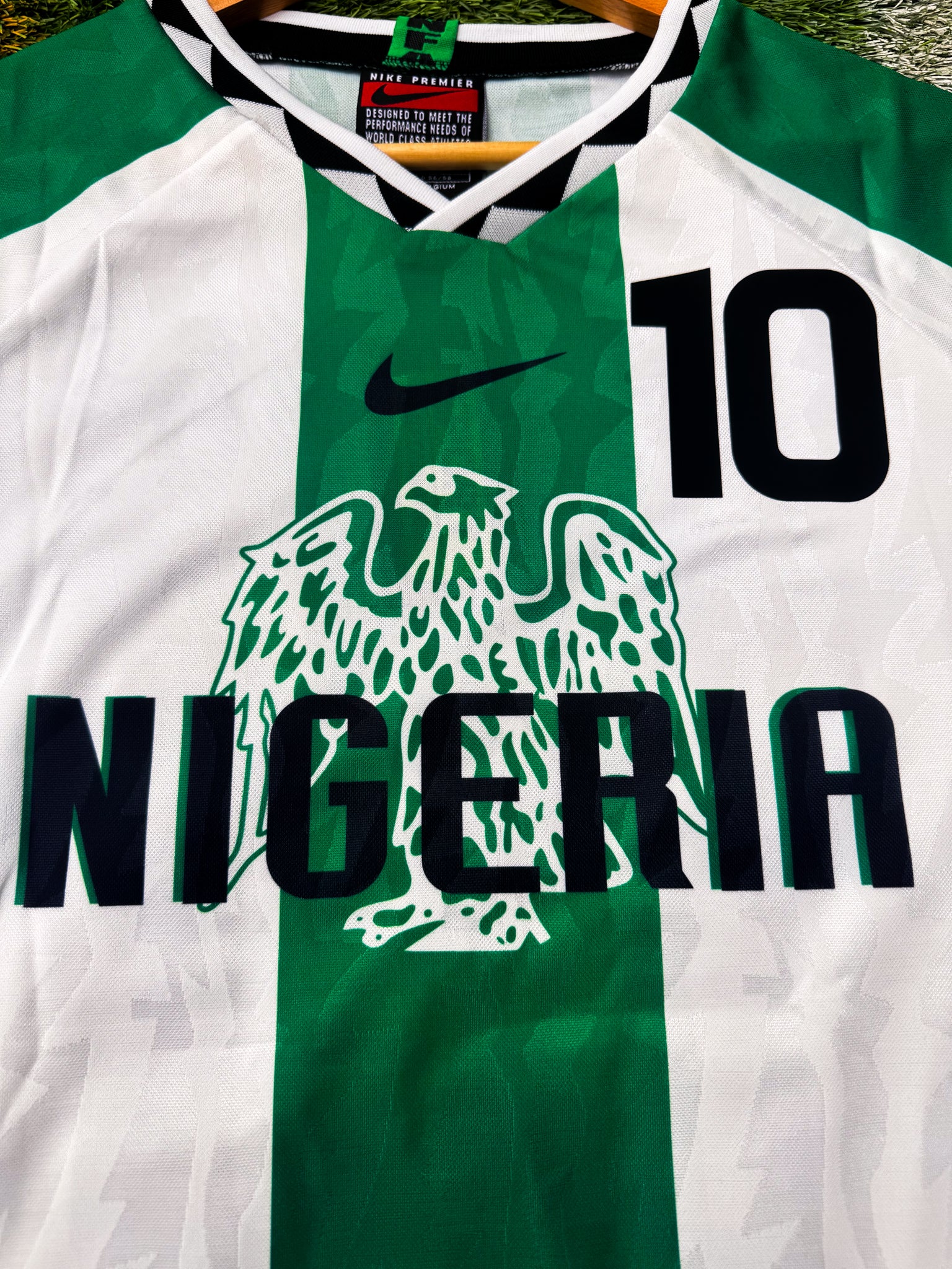 Detail of Super Eagles crest and vintage Nike logo


