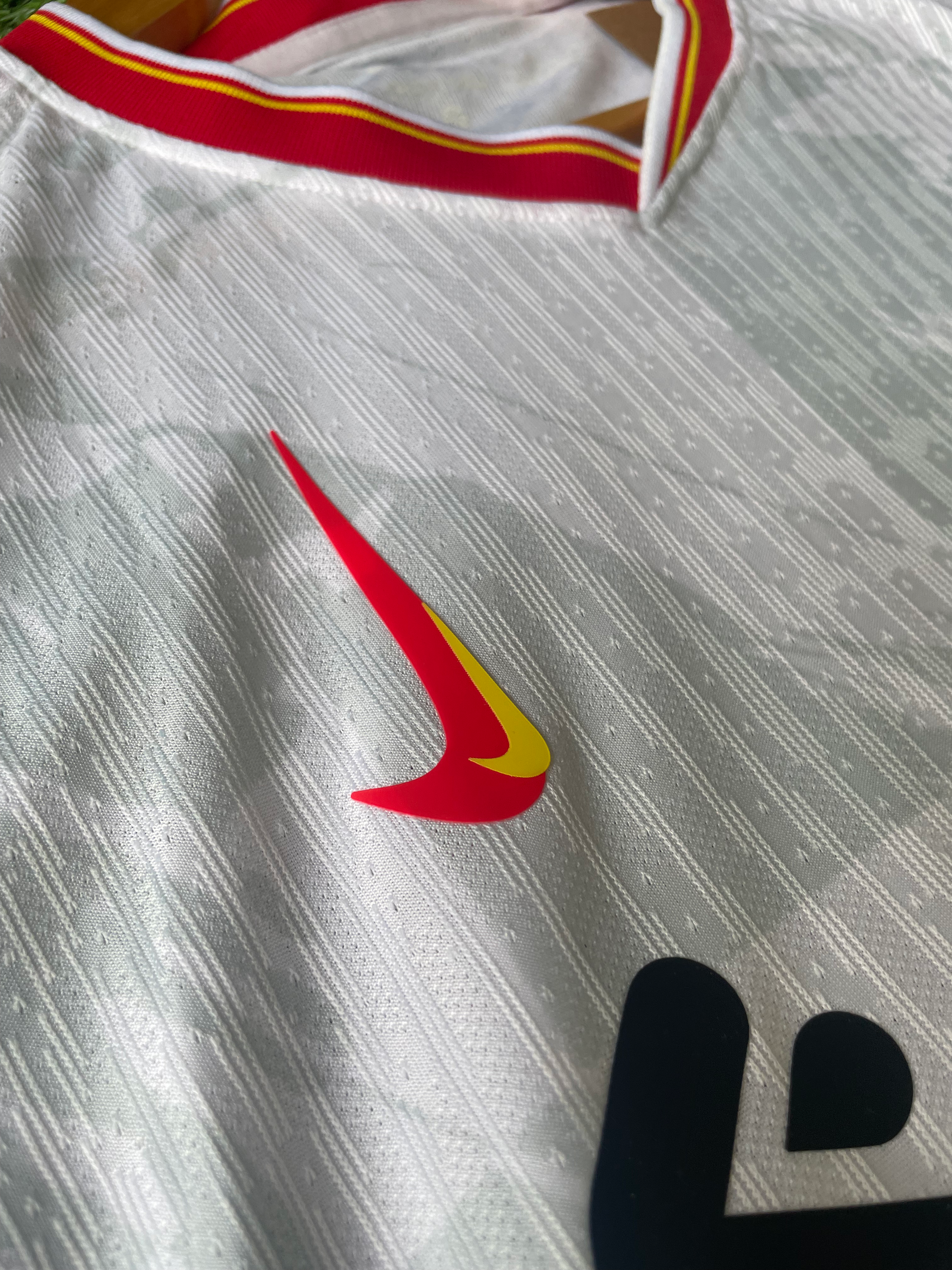 Close-up of Liverpool crest and Premier League Champions badge

