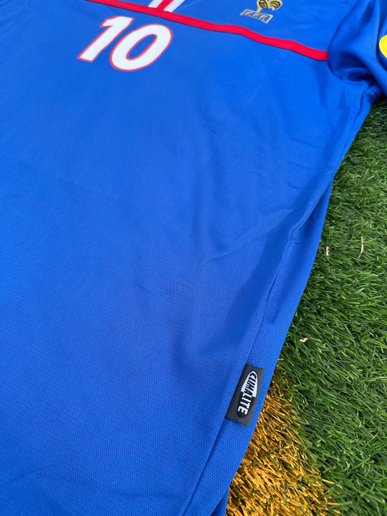Detail of the FFF crest and Adidas logo

