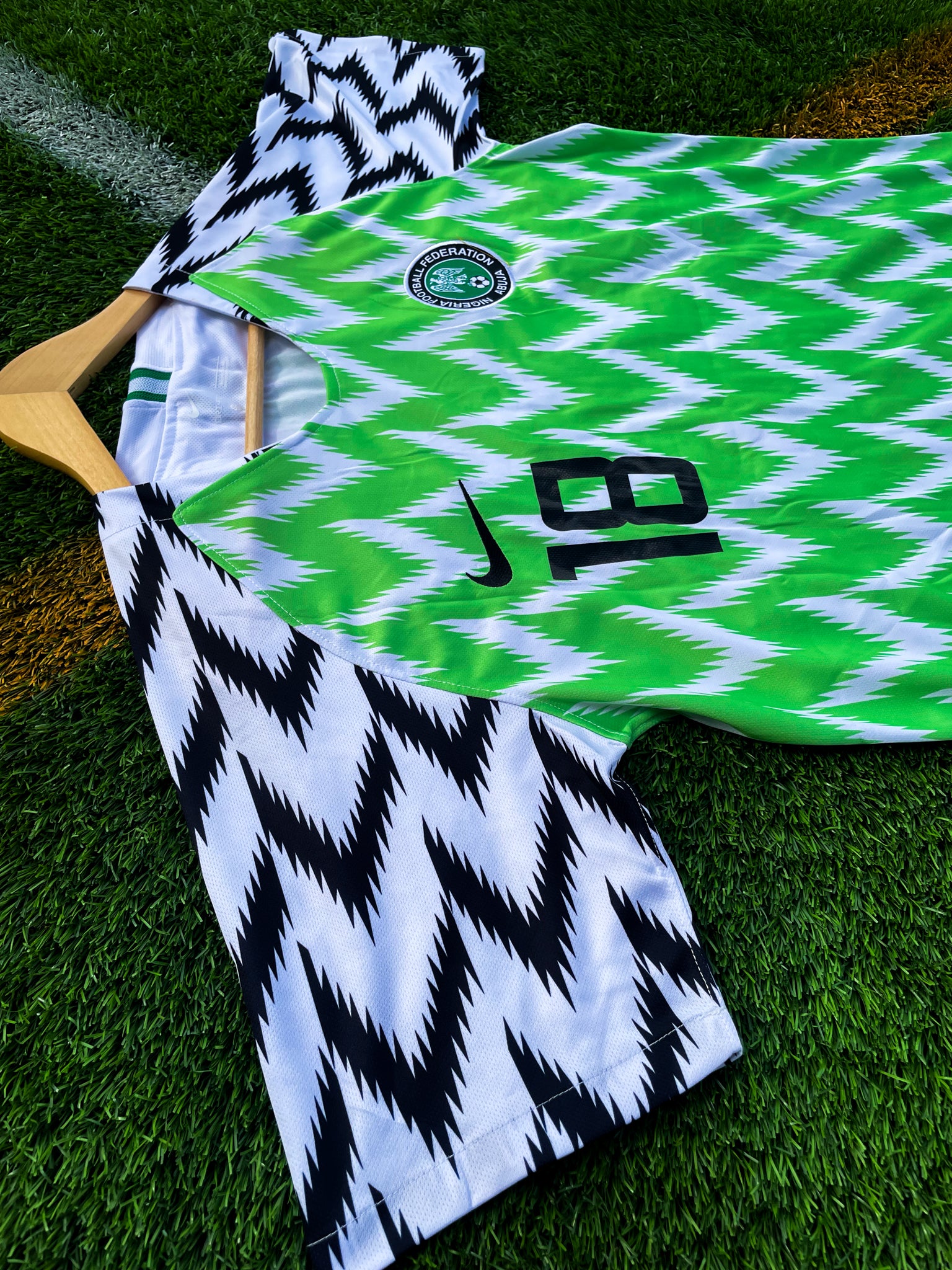 Detail of Super Eagles crest and Nike logo


