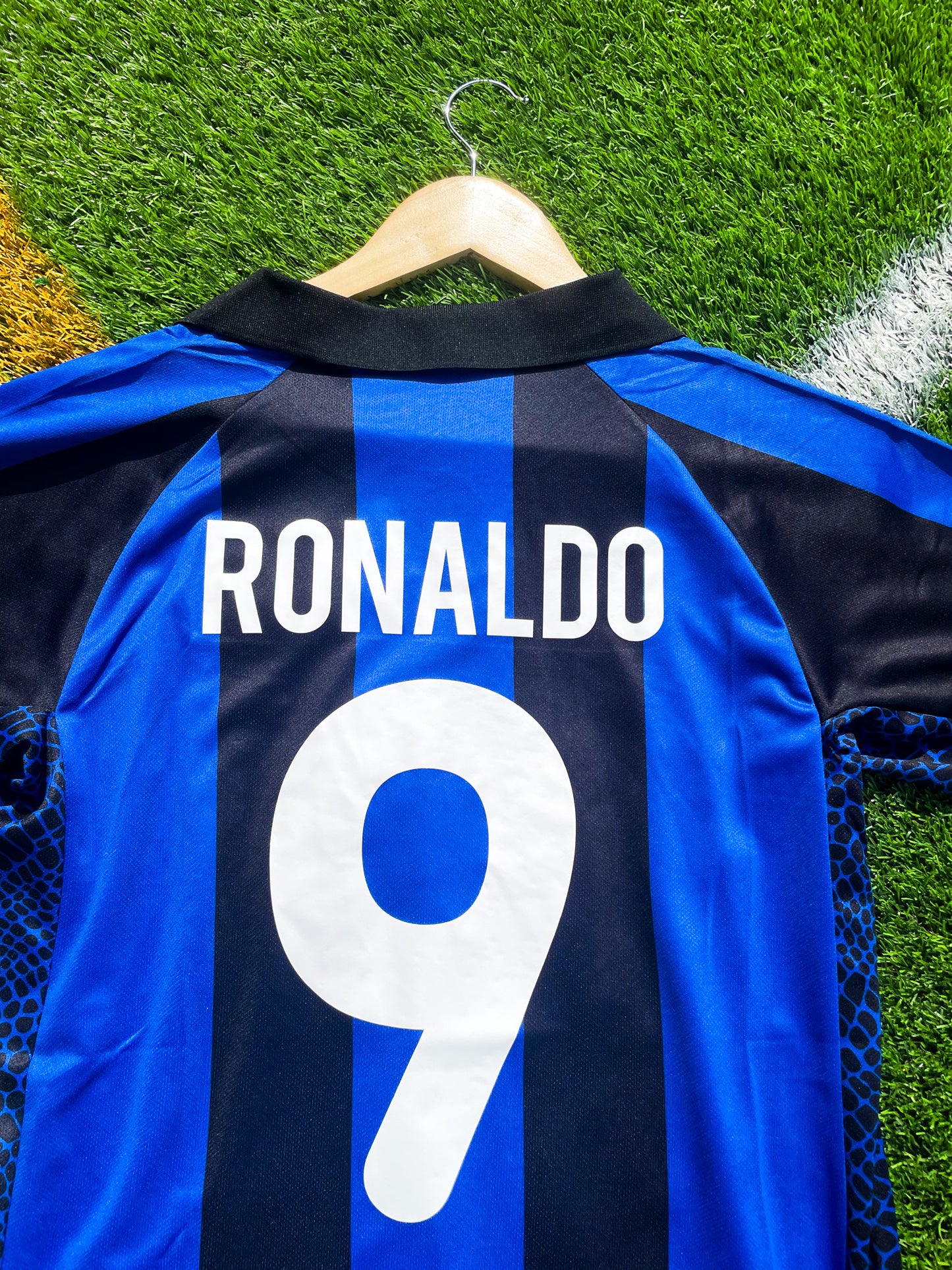 Close-up of Nike logo, Inter crest, and Pirelli sponsor

