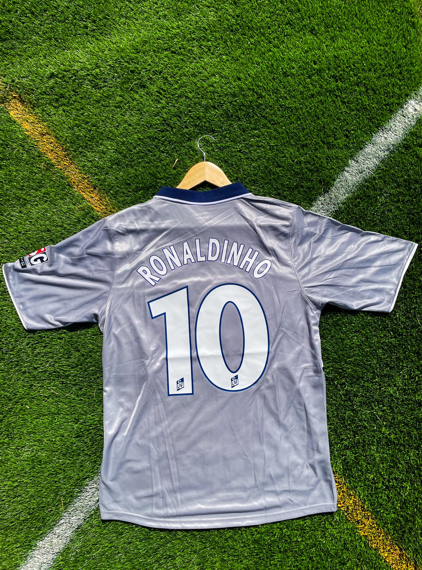 Back view showing Ronaldinho #10 on silver-grey fabric

