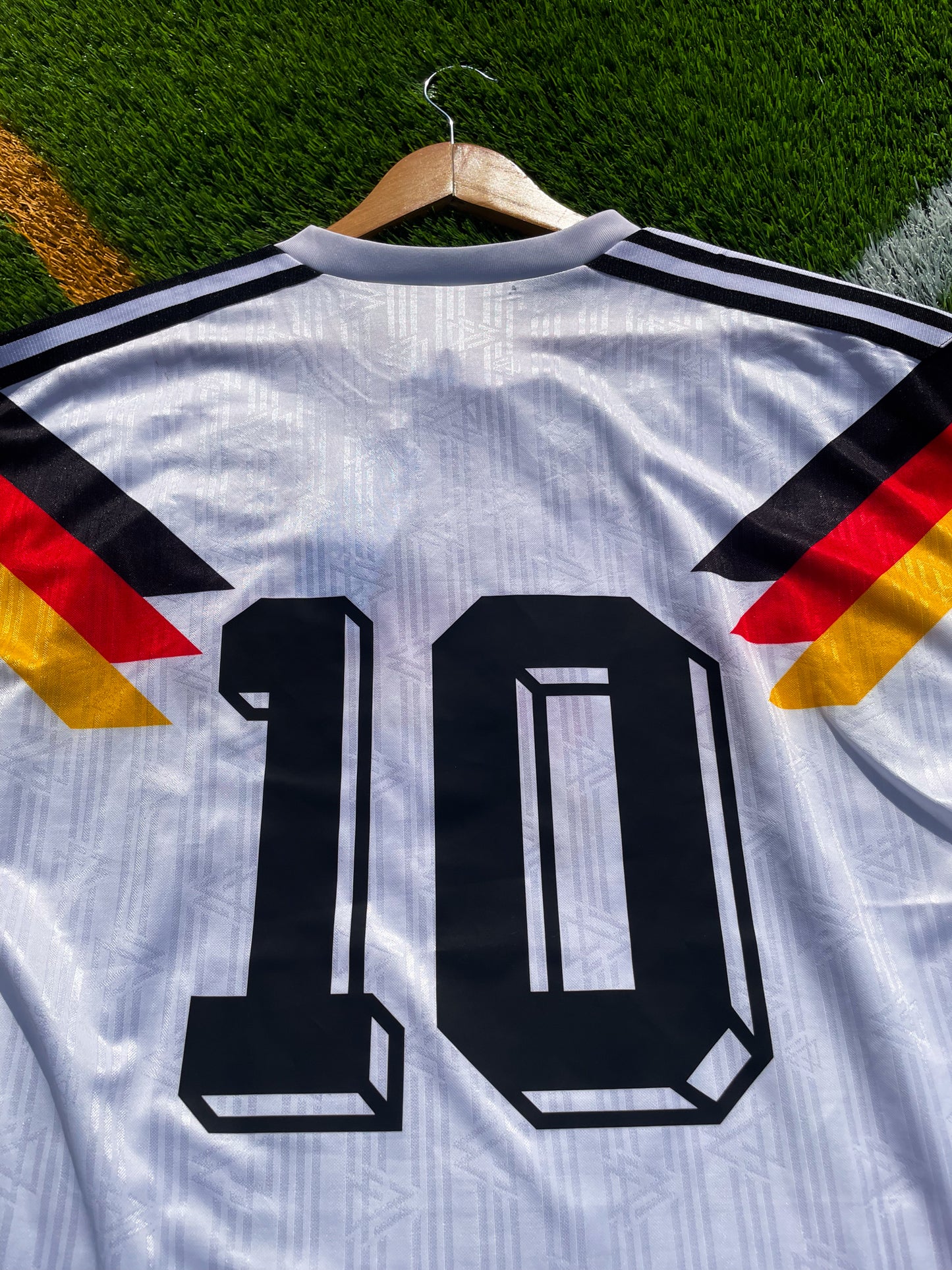 Back of the jersey featuring #10 in bold black font

