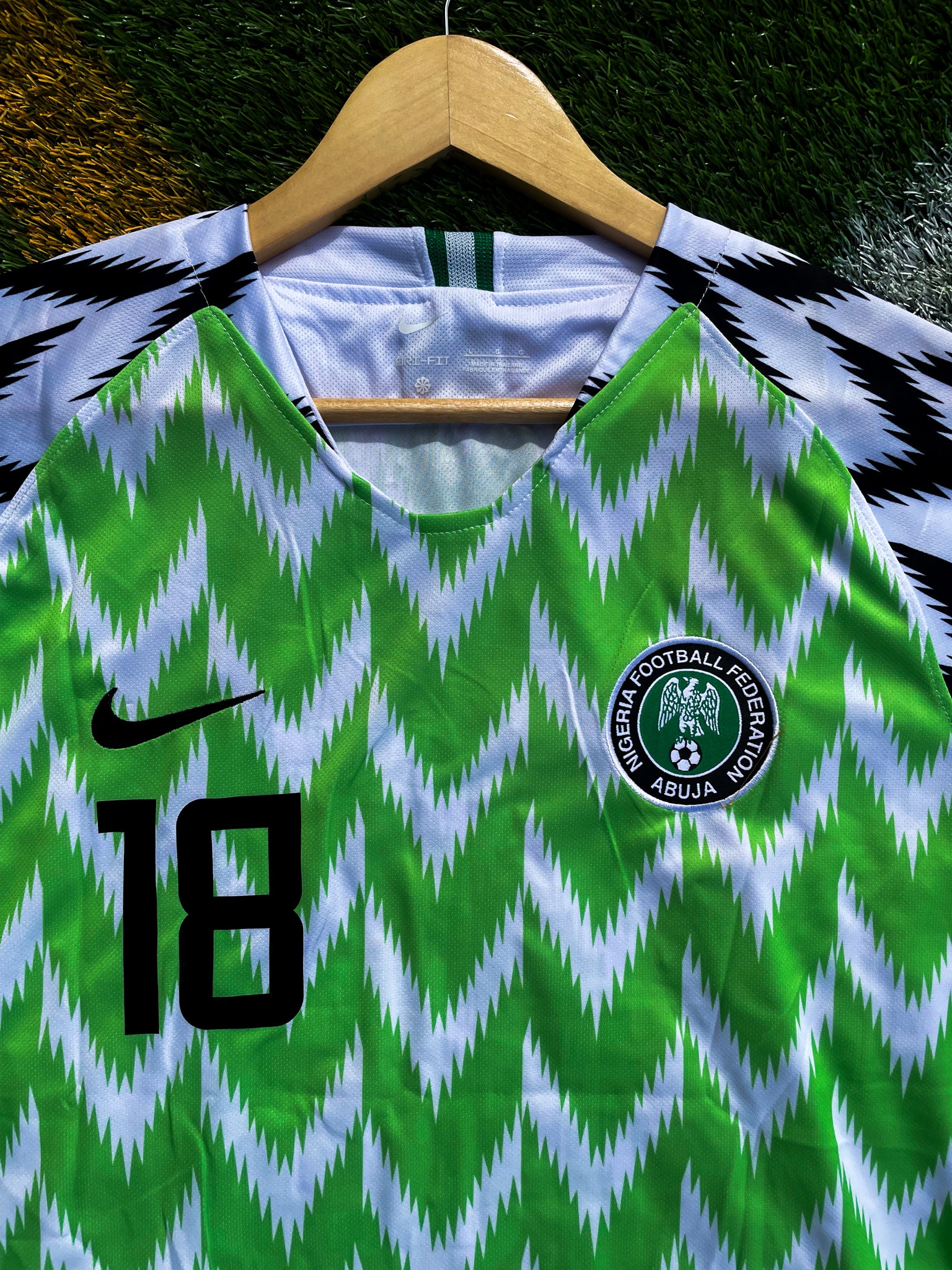 Detail of Super Eagles crest and Nike logo

