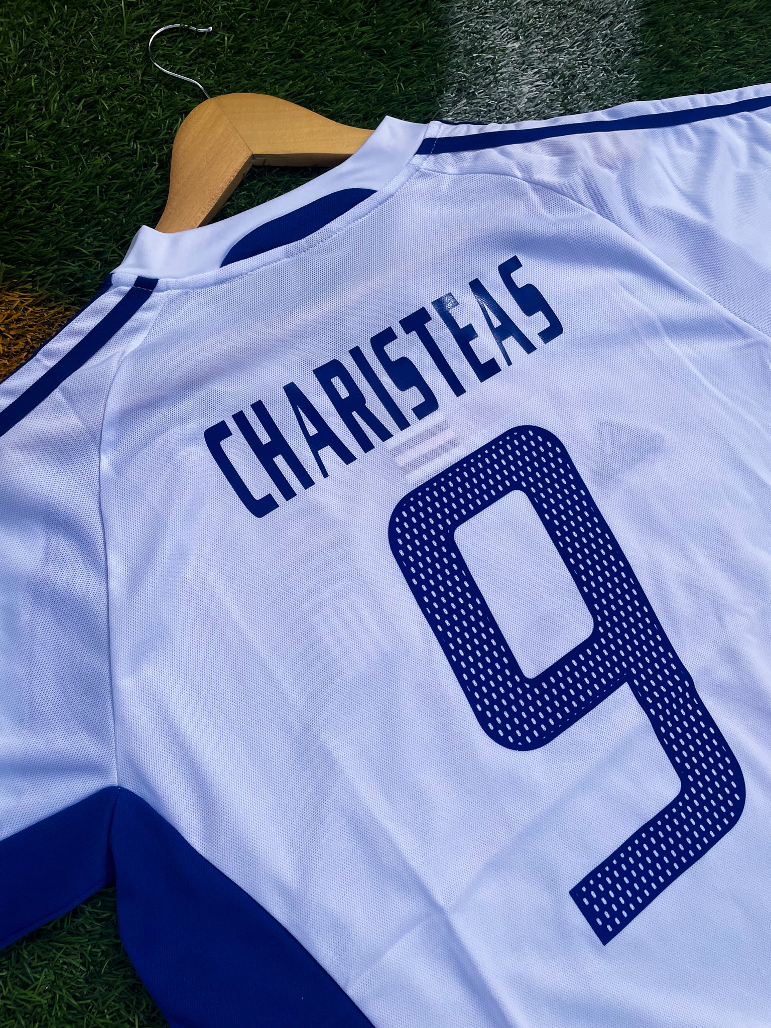 Back of the jersey featuring Charisteas #9

