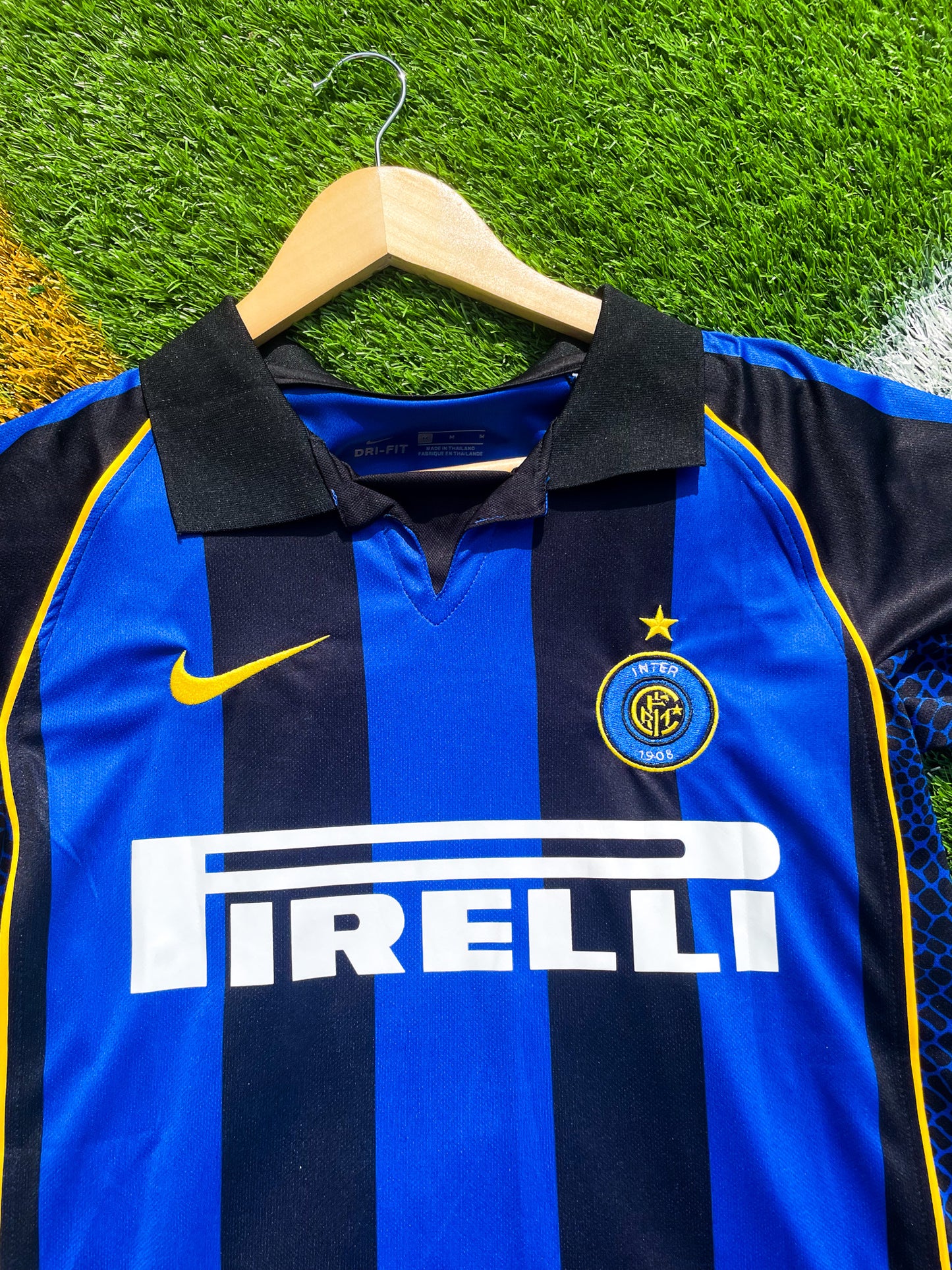 Close-up of Nike logo, Inter crest, and Pirelli sponsor

