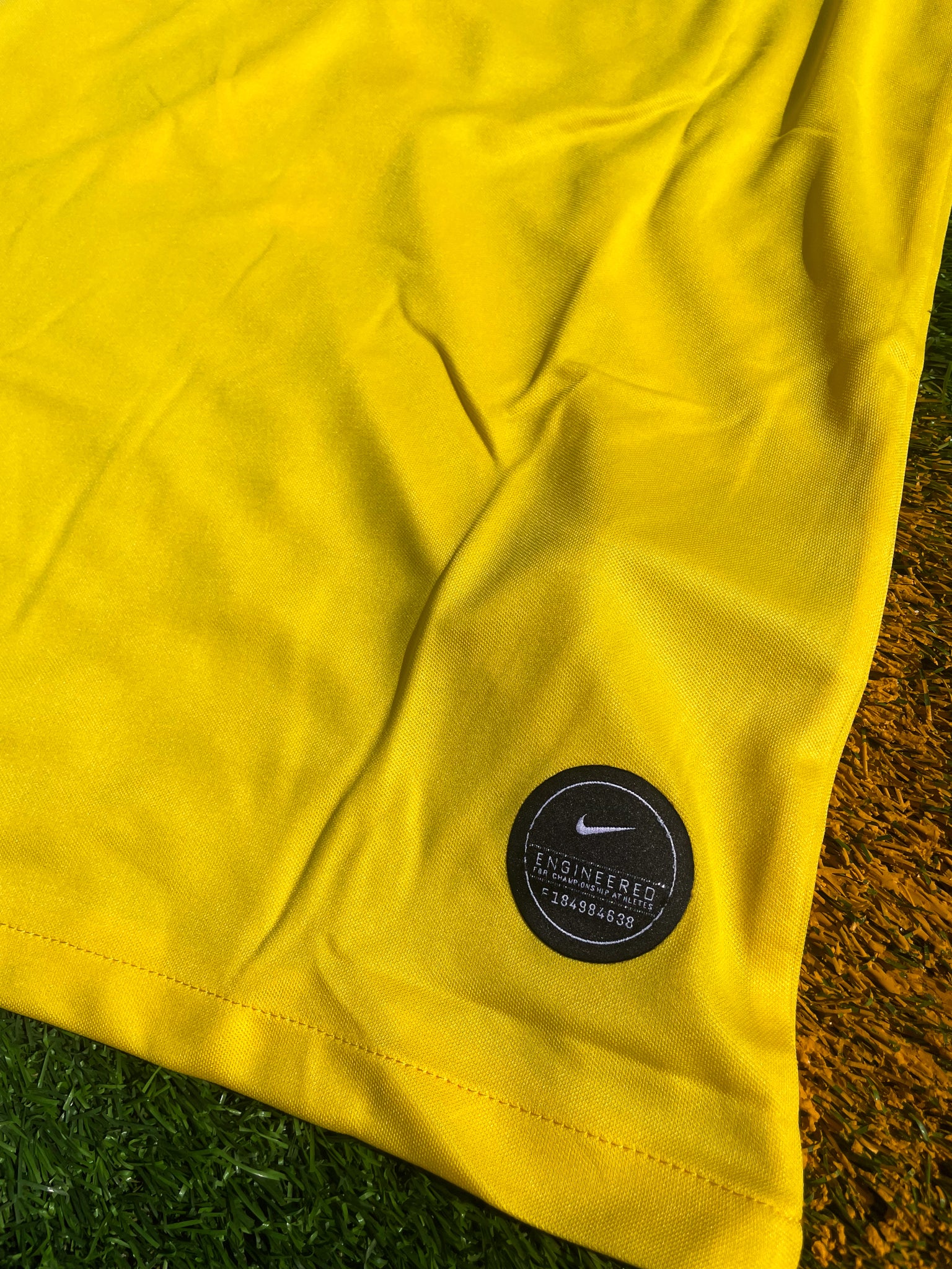 Fabric detail shot highlighting yellow and green accents
