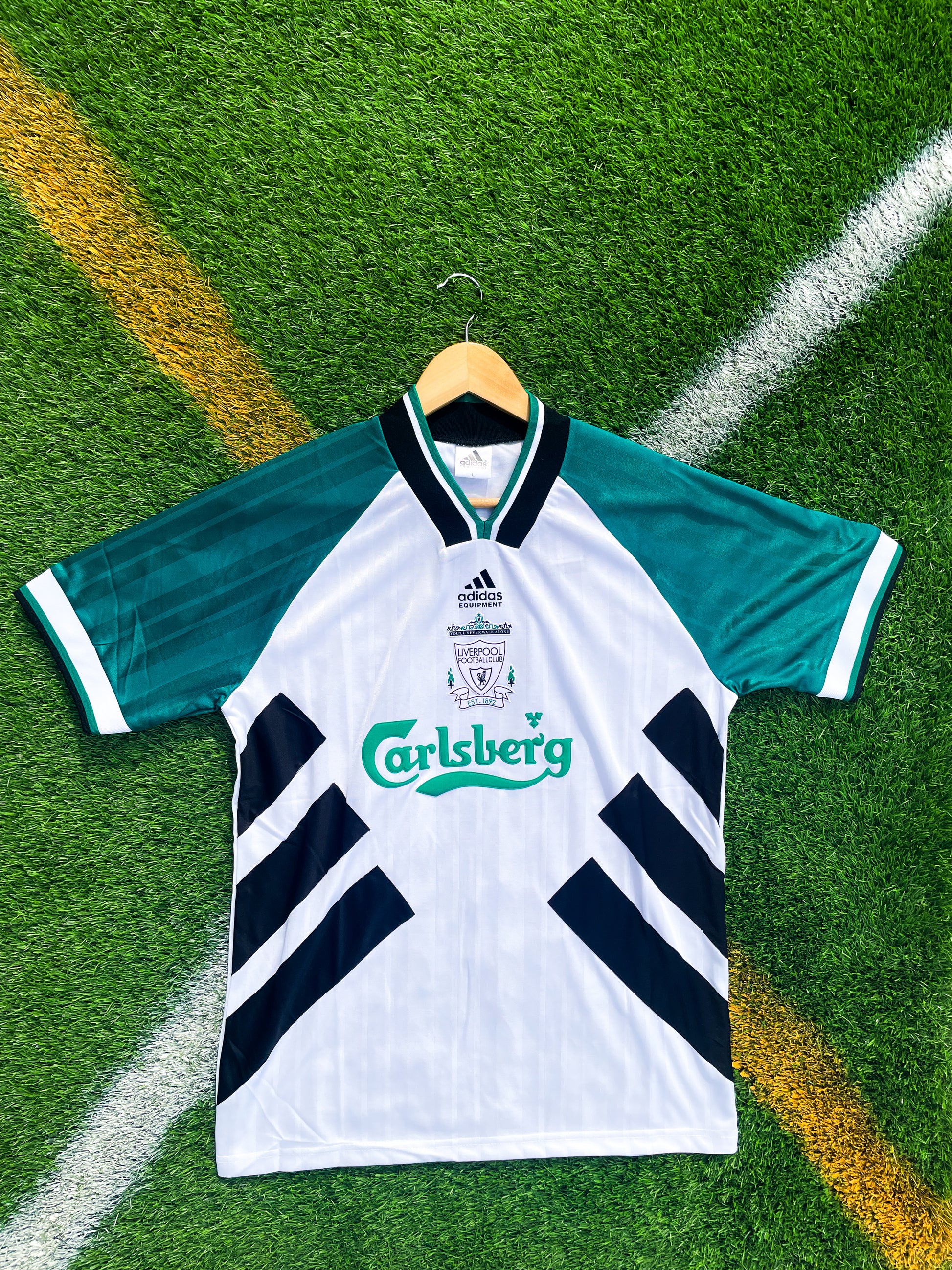 Front view of Liverpool 1993–1995 Away Jersey in white with Carlsberg sponsor

