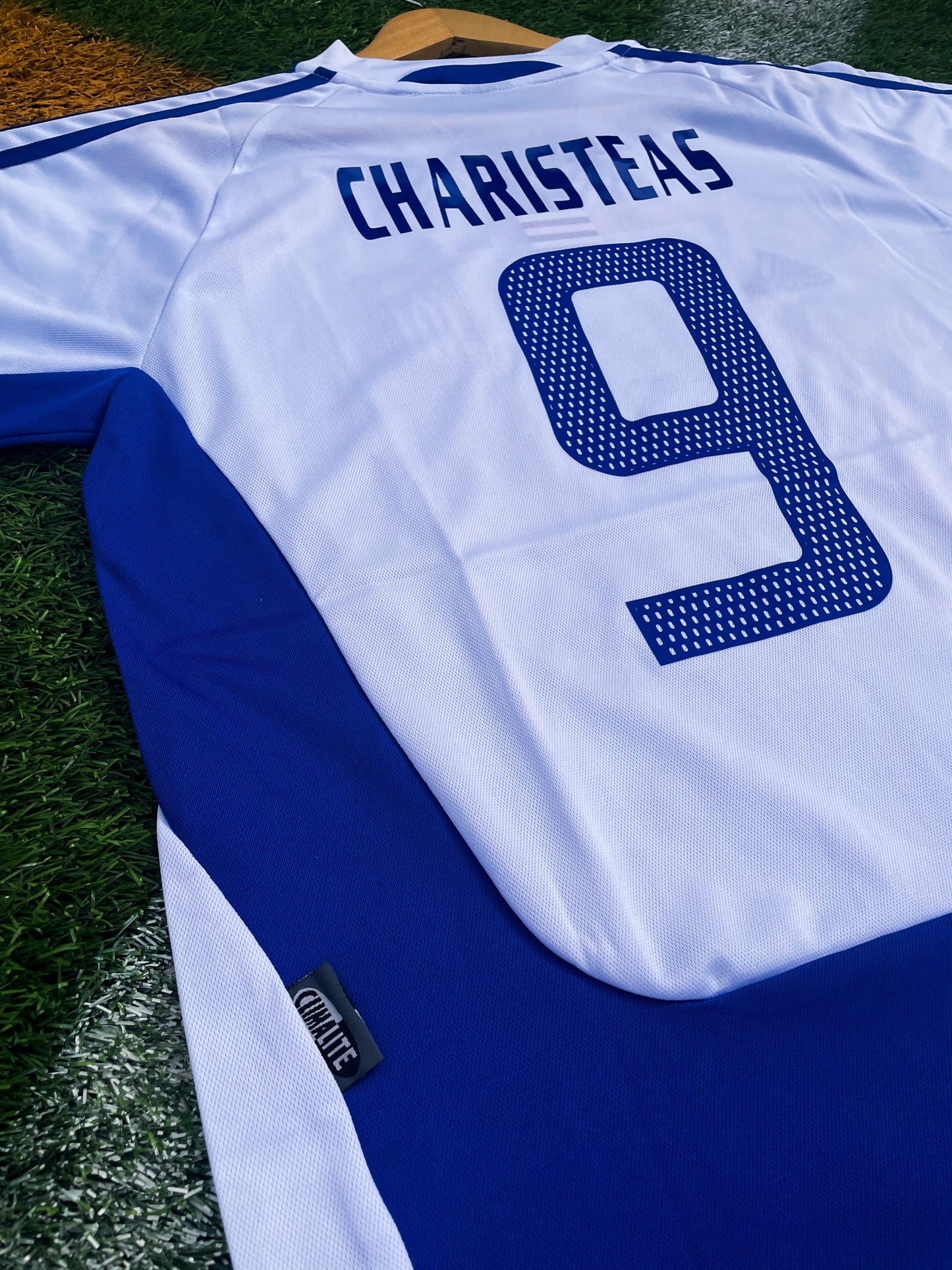Back of the jersey featuring Charisteas #9

