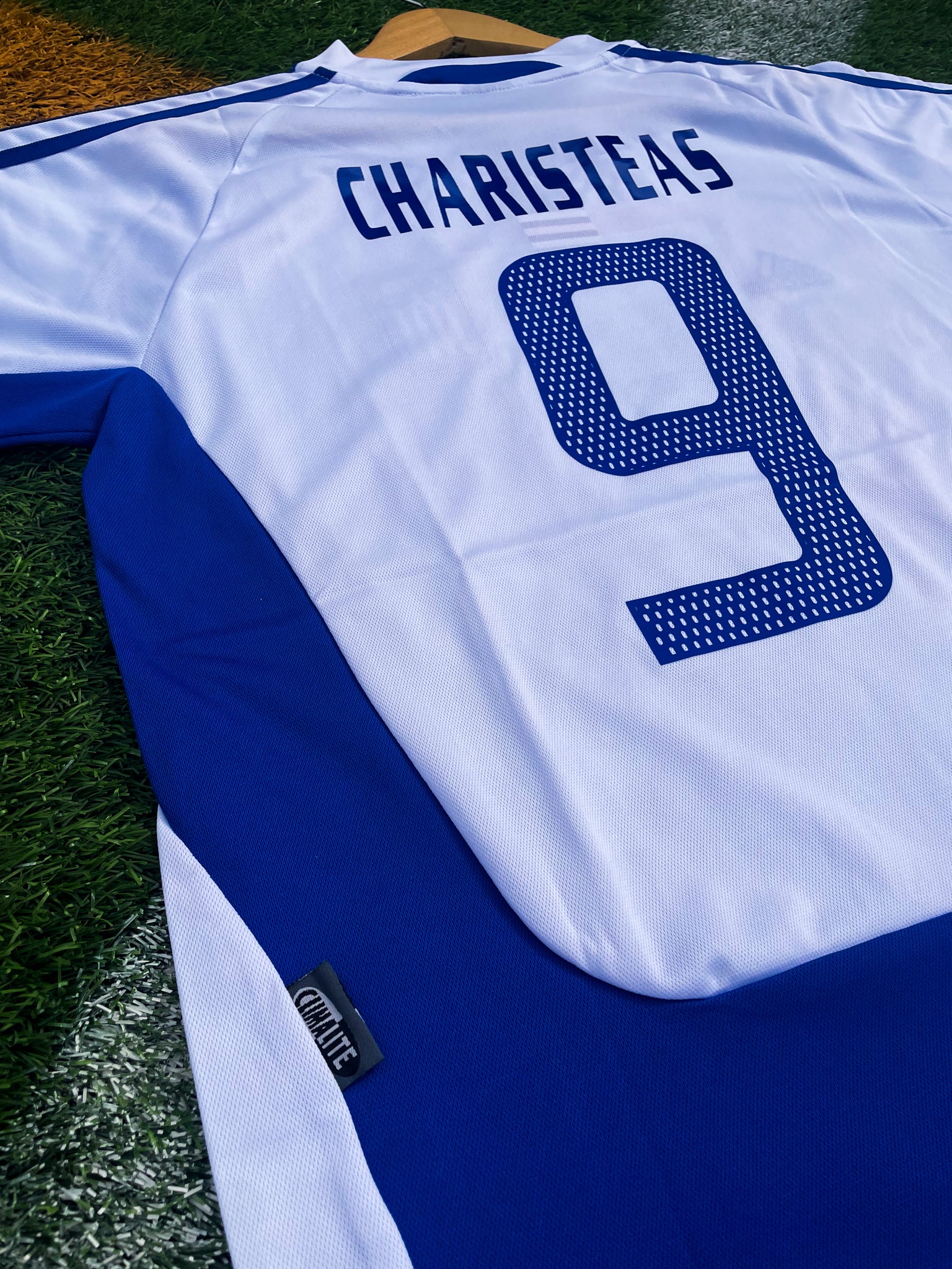 Back of the jersey featuring Charisteas #9

