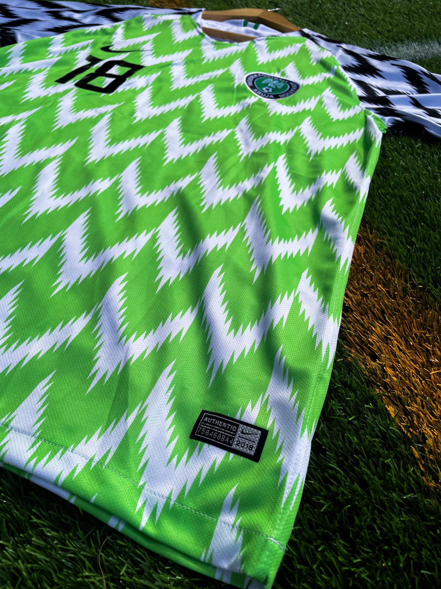 Detail of Super Eagles crest and Nike logo

